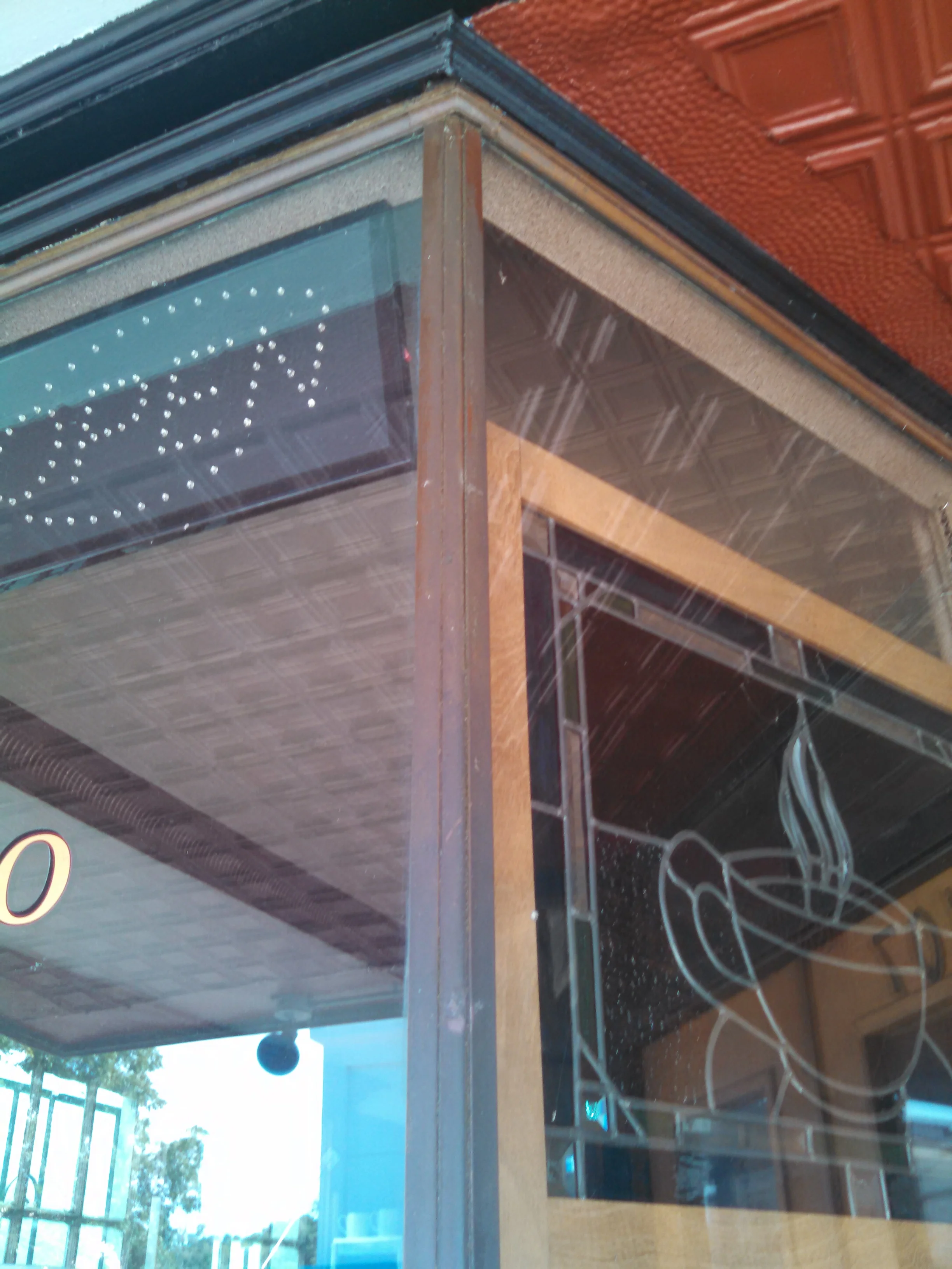 Closer detail of the metal storefront.