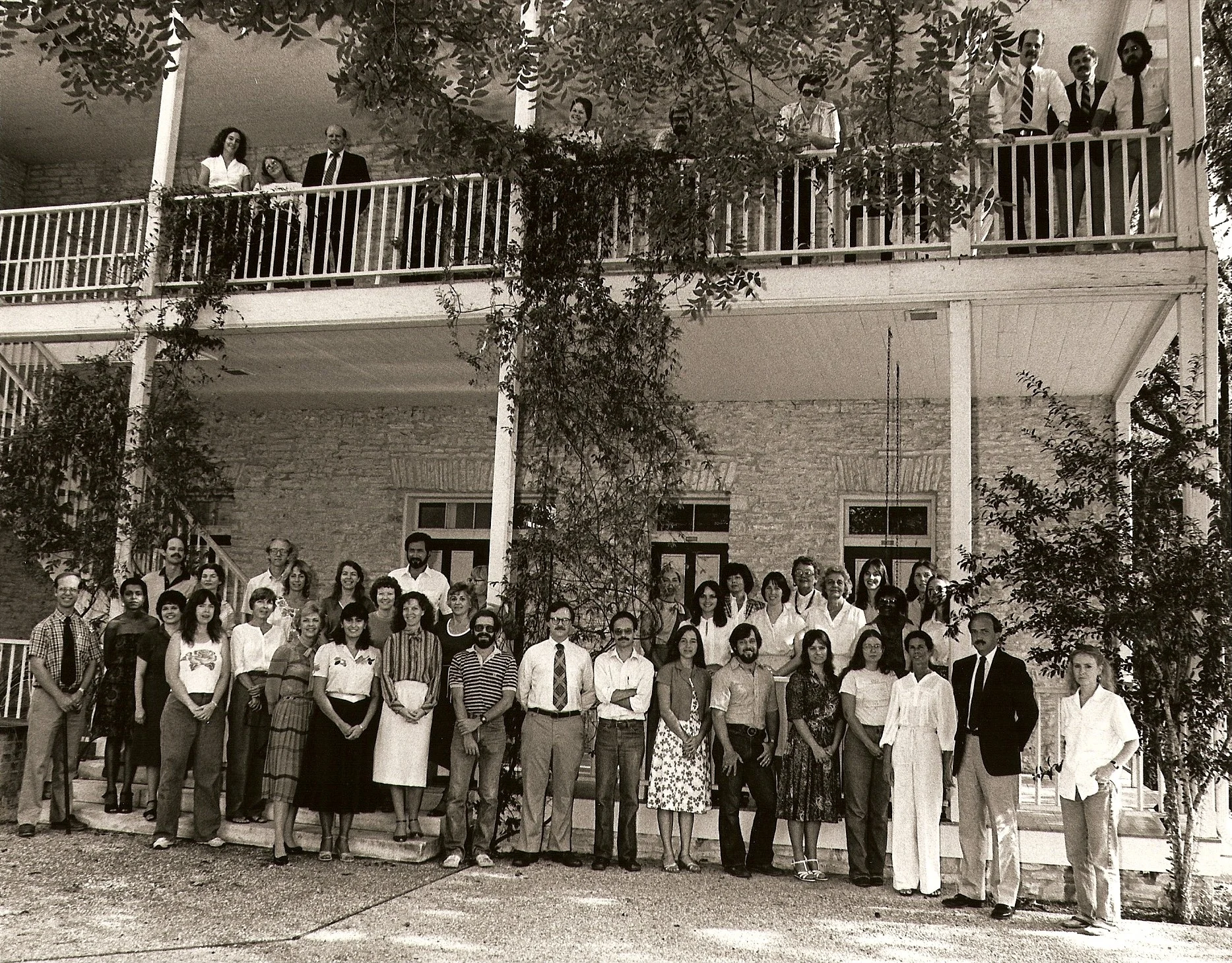 Staff members of the THC pose on the building’s back porch. Anice is sixth from the left, front row.