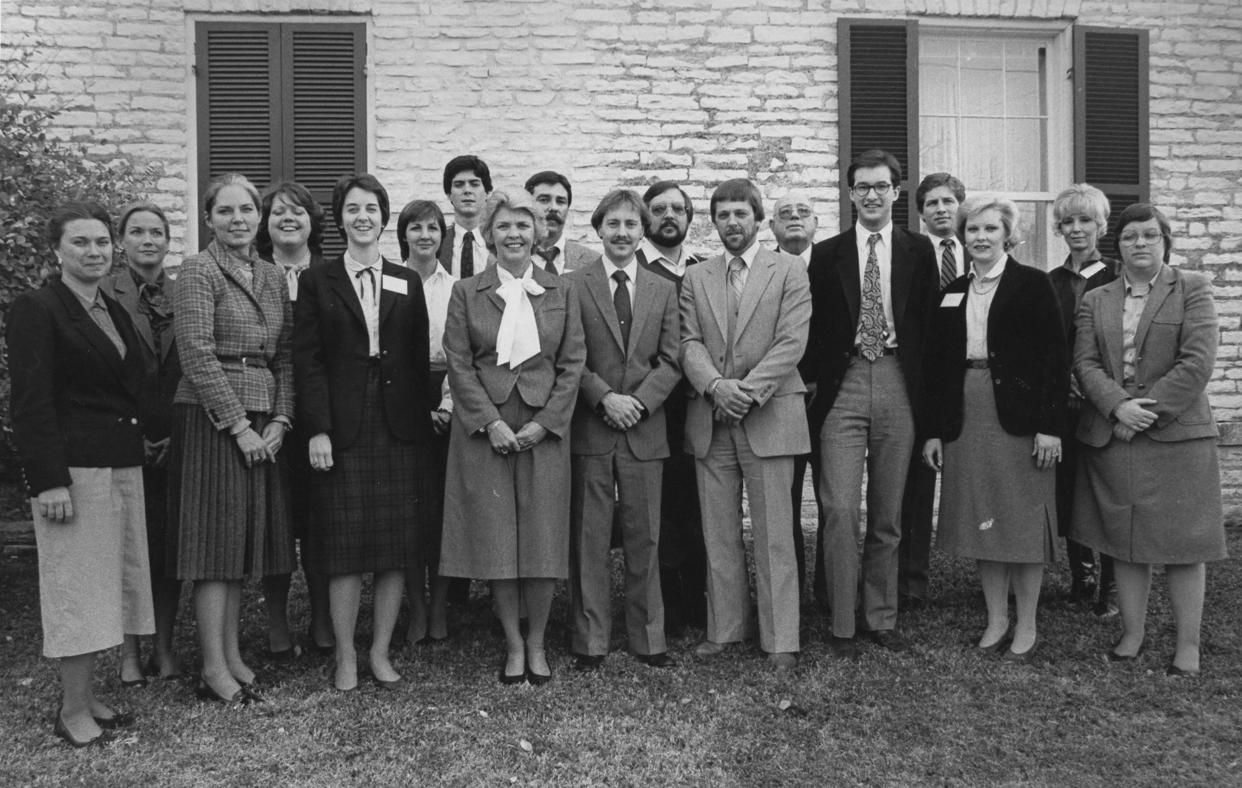 Some of the first Main Street managers in Texas pose at the THC’s executive offices which are housed in the historic Carrington-Covert House near the state Capitol. Anice is at center.