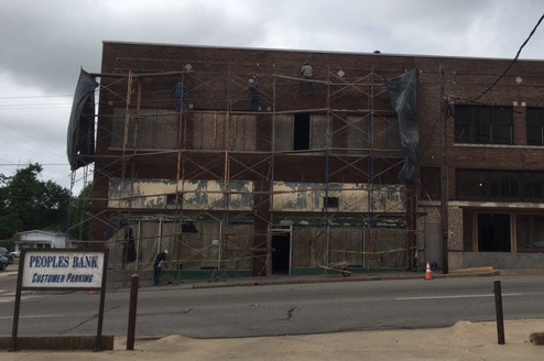 Paint removal in process at 134 1st St. SW in Paris.