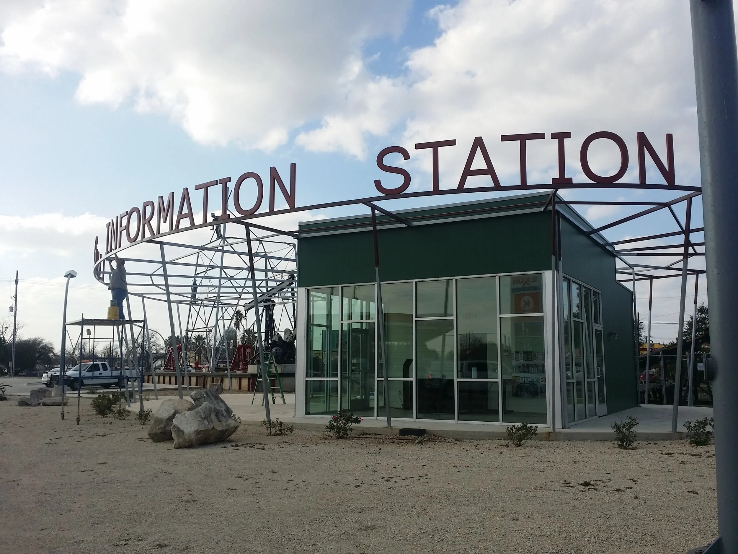 Where: Luling, TXWhen: February 2017This new infill Visitor's information Center project was in the final stages of construction when we visited. What a treat! &nbsp;In the background is a portion of an oil derrick and pumps. &nbsp;The design fits i…