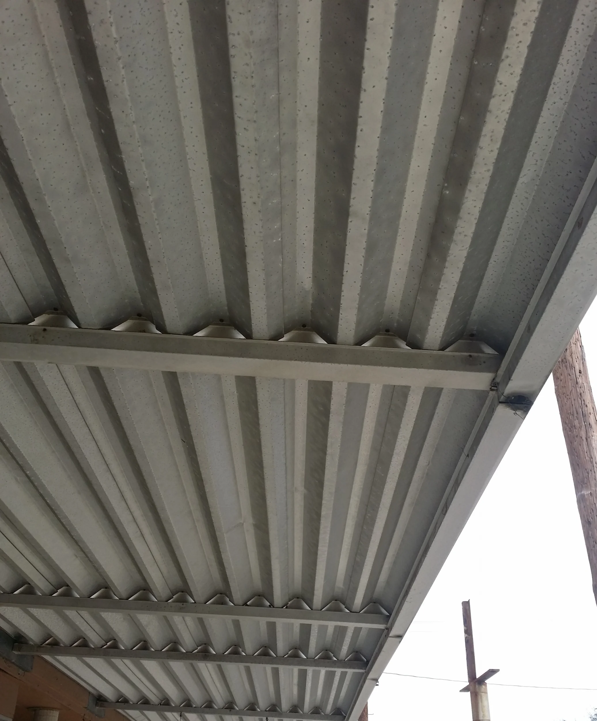 Where: I won't say whereWhen: 2017Craftsmanship and materials in canopies is something we are currently encouraging. &nbsp;There are lots of appropriate choices in both metal and wood for new canopies. &nbsp;This is a prime example of the type of me…