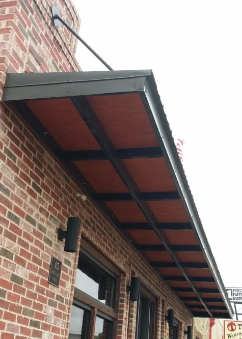 Where: Killeen, TXWhen: November 2016This is a good new canopy for a historic district. Note the metal frame and most importantly wood beadboard (not cheap corrugated metal)&nbsp;on the underside.&nbsp;