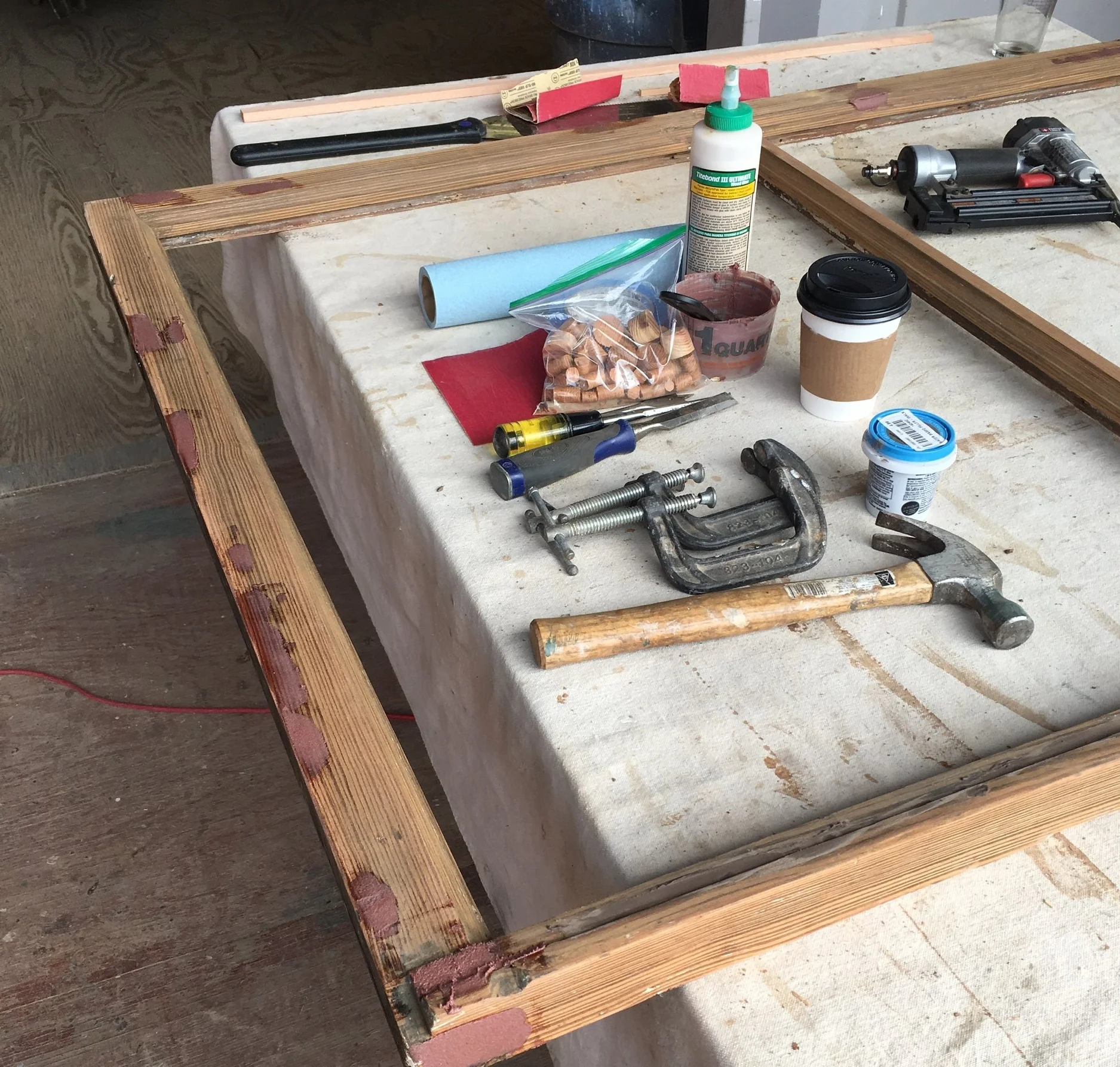 Bare wood is inspected and weak spots are repaired using consolidants, epoxies, and woodplugs.