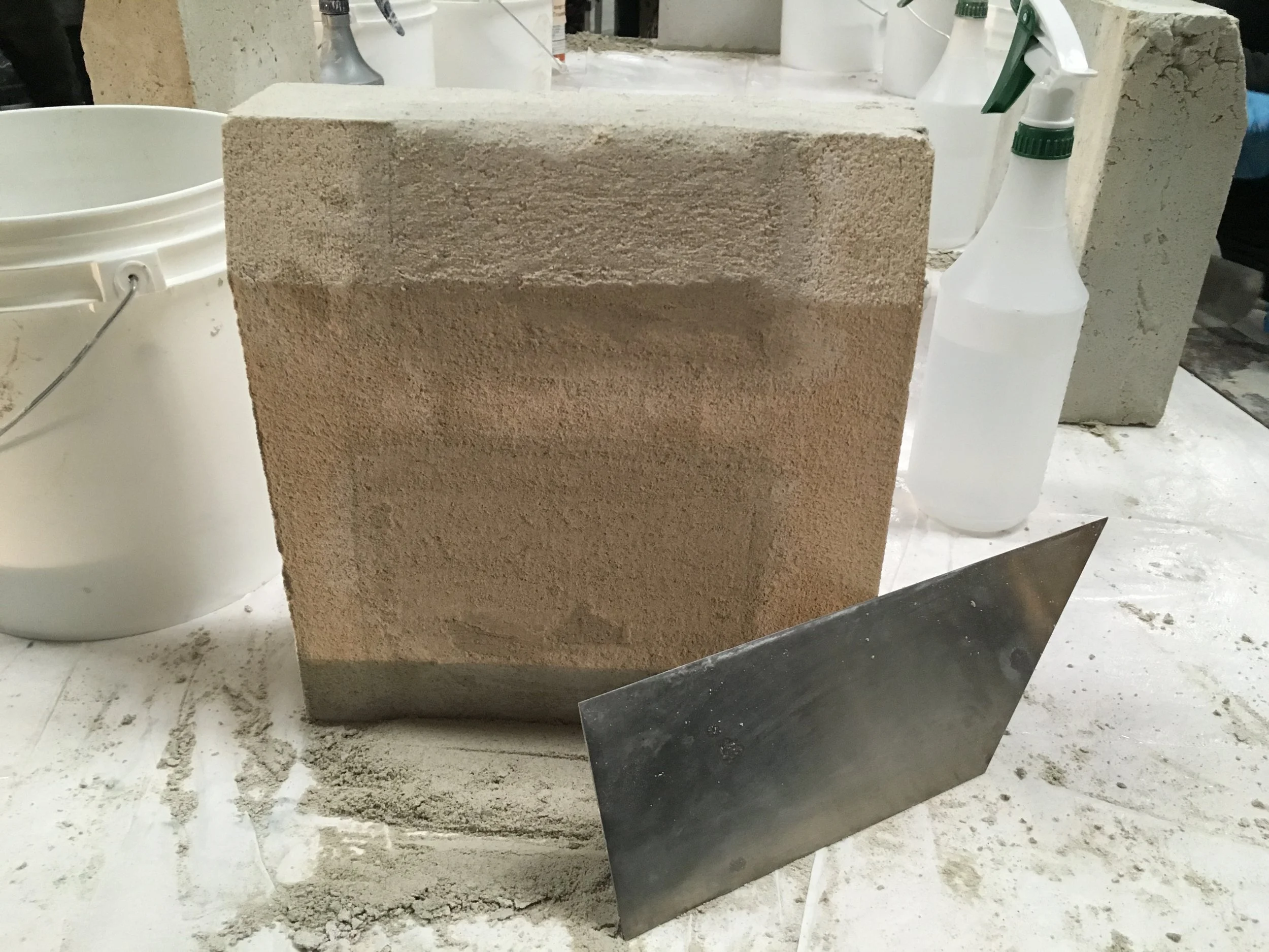 The hole is cleaned and squared off so that the mortar mixture will properly adhere to the masonry.