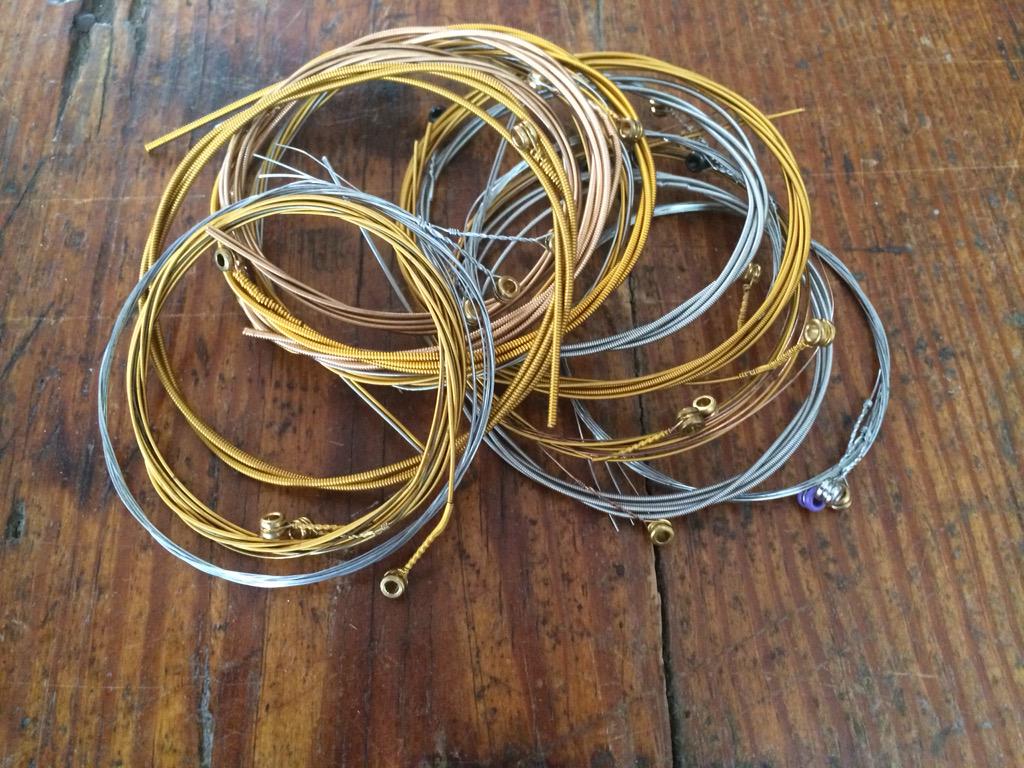 Look at Tim McGraw's guitar string bracelets that go to the Tug McGraw Foundation!