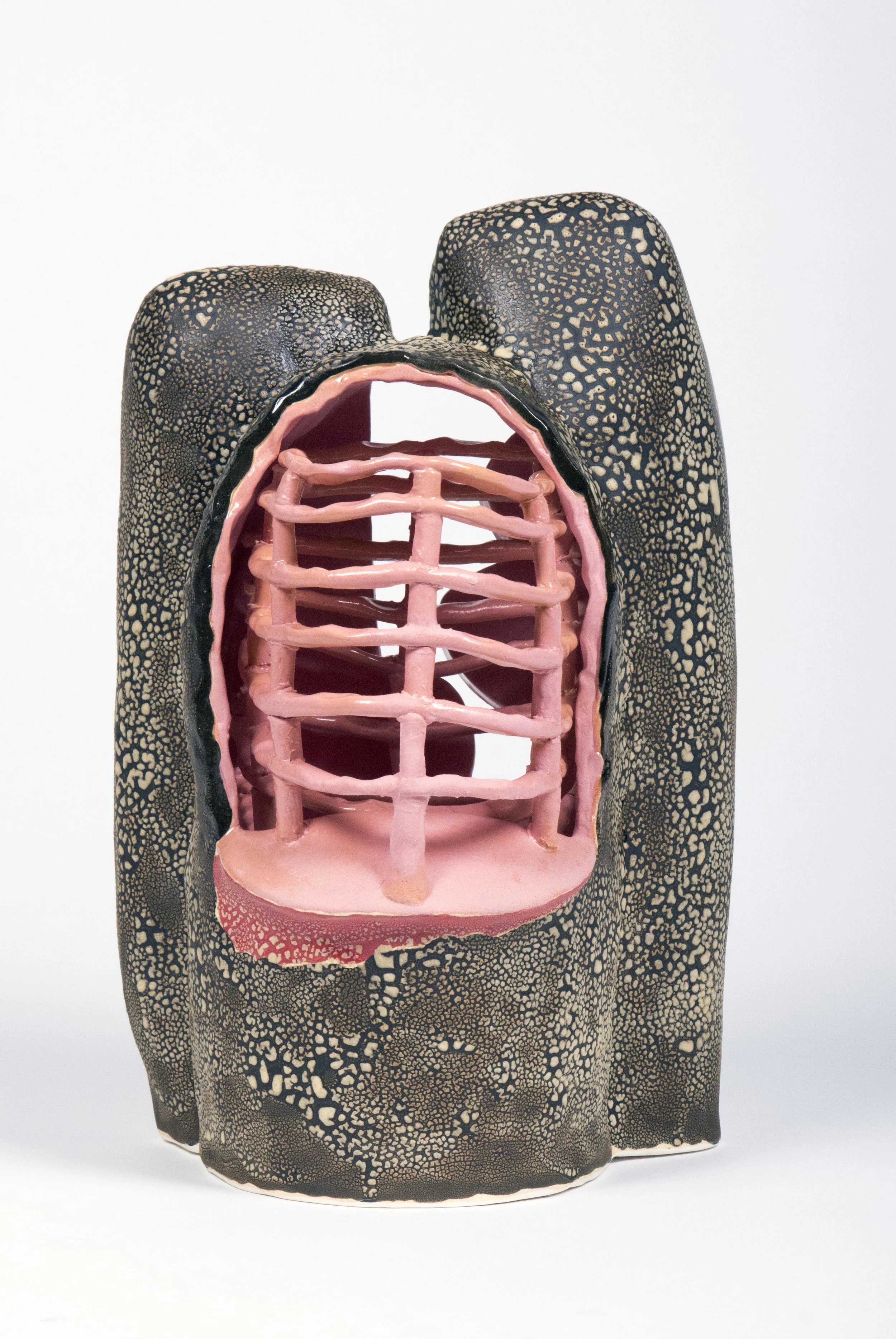 white earthenware with colored clay, underglazes, and glaze. Electric fired to cone 04.