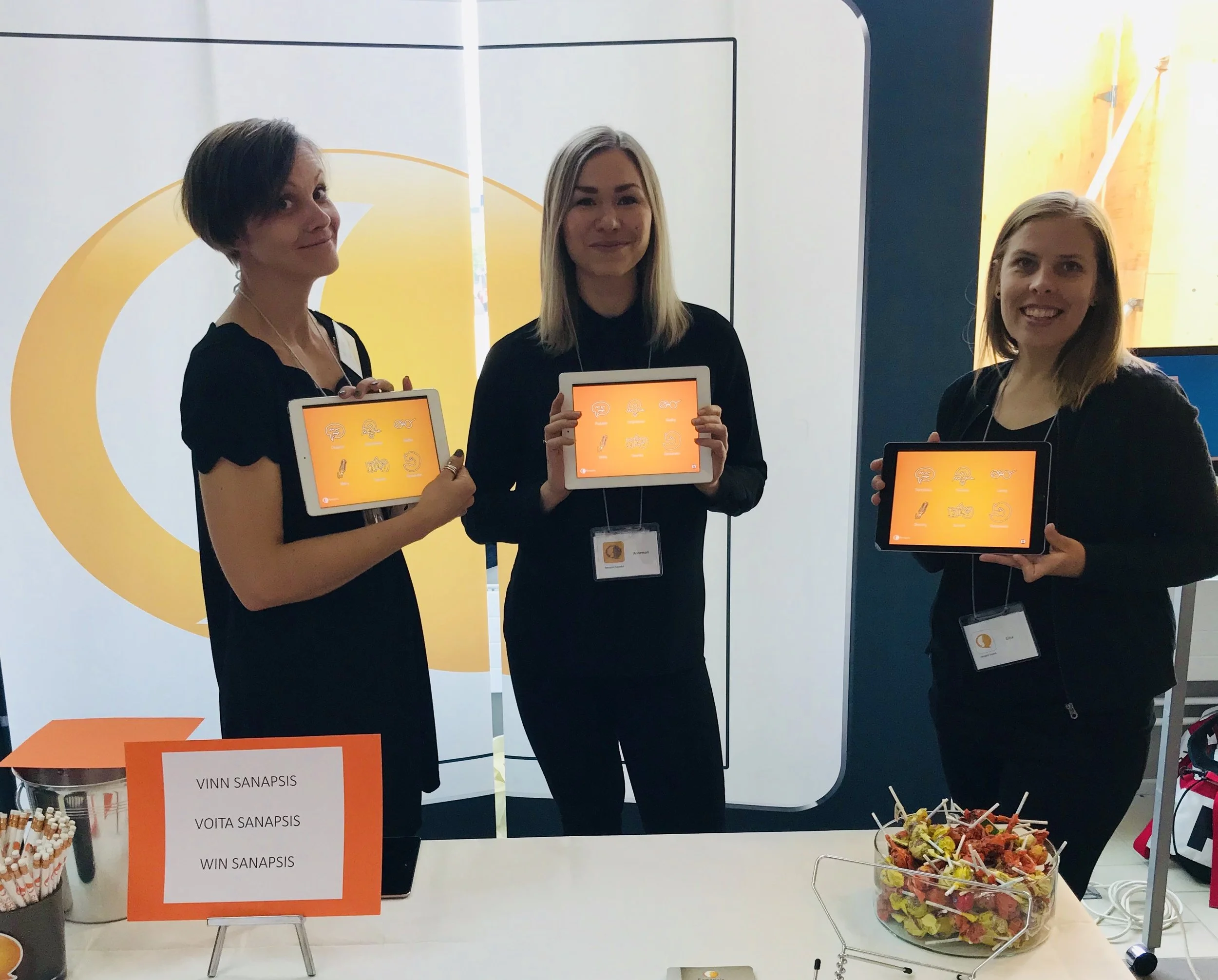 Our team of SLPs (Nana, Annemari and Elina) showing off their favorites at NAC2019 (June 2019).