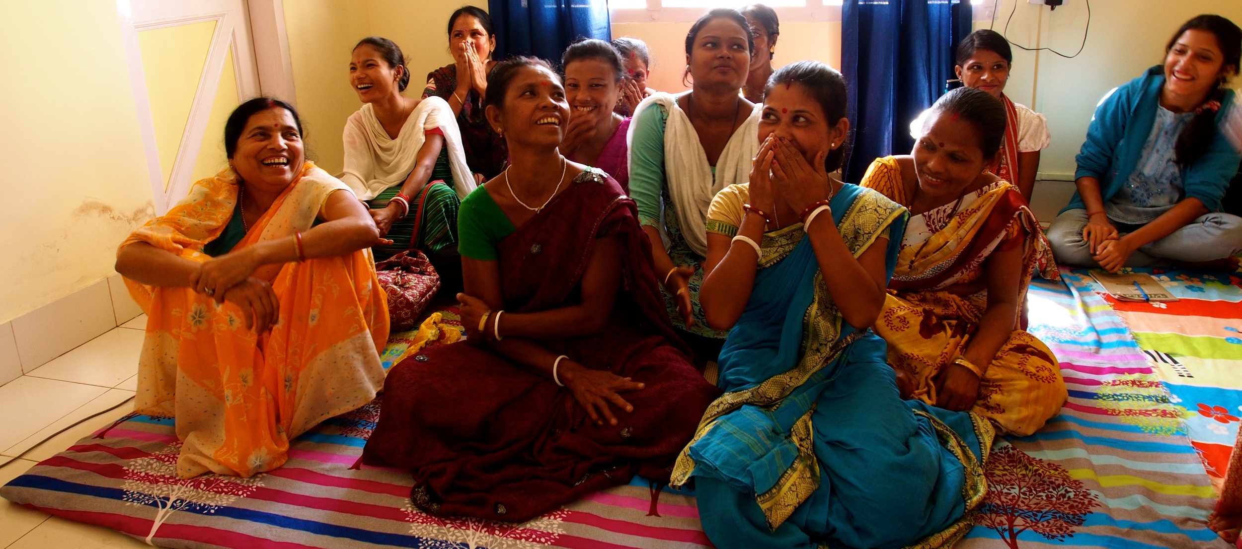 Sahayikas laugh during training