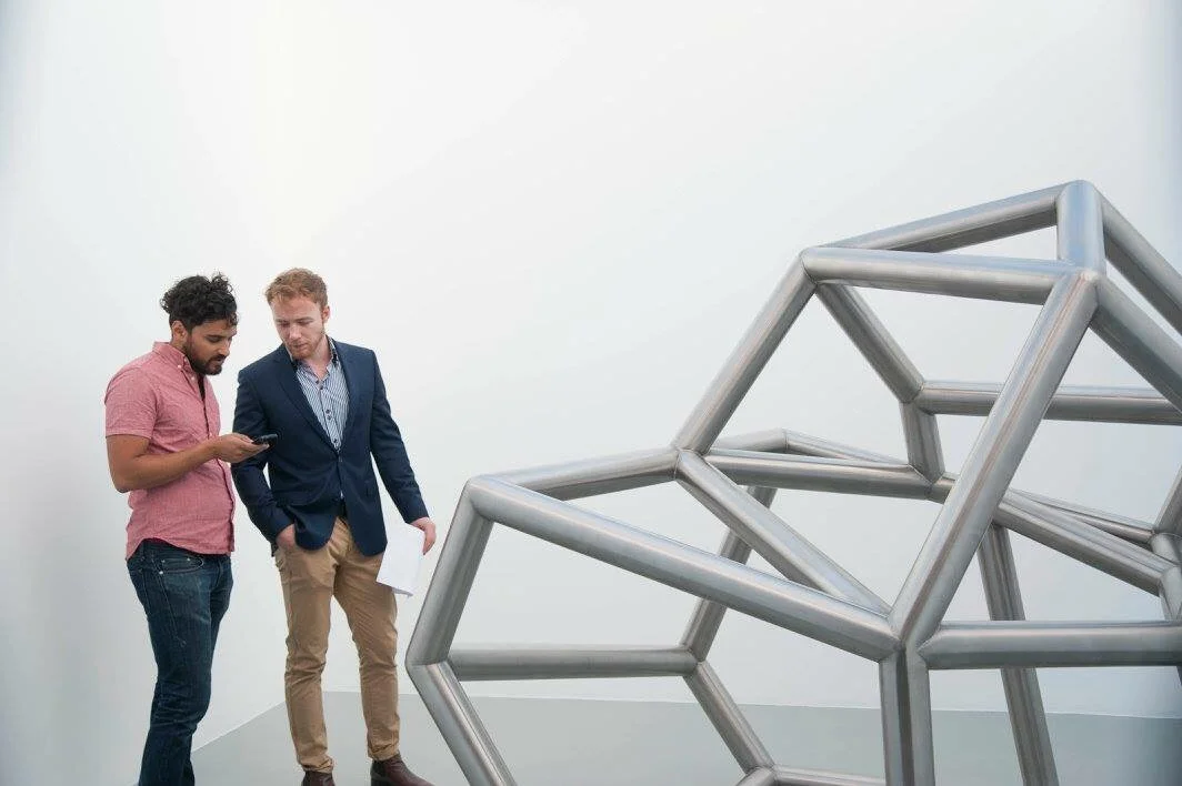 Johan and I discussing a Modernist sculpture Siamese Metal #6 by Richard Deacon
