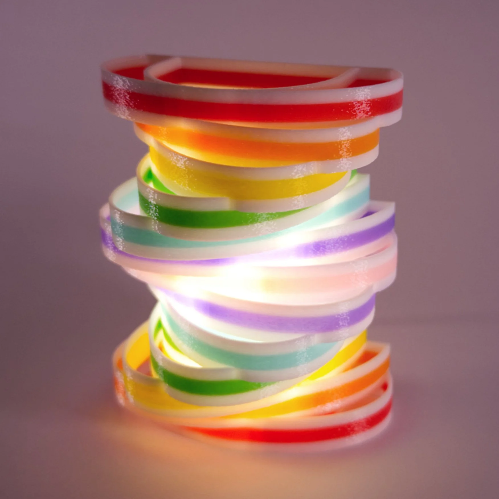 Single rainbow Spinoval night light, lit up