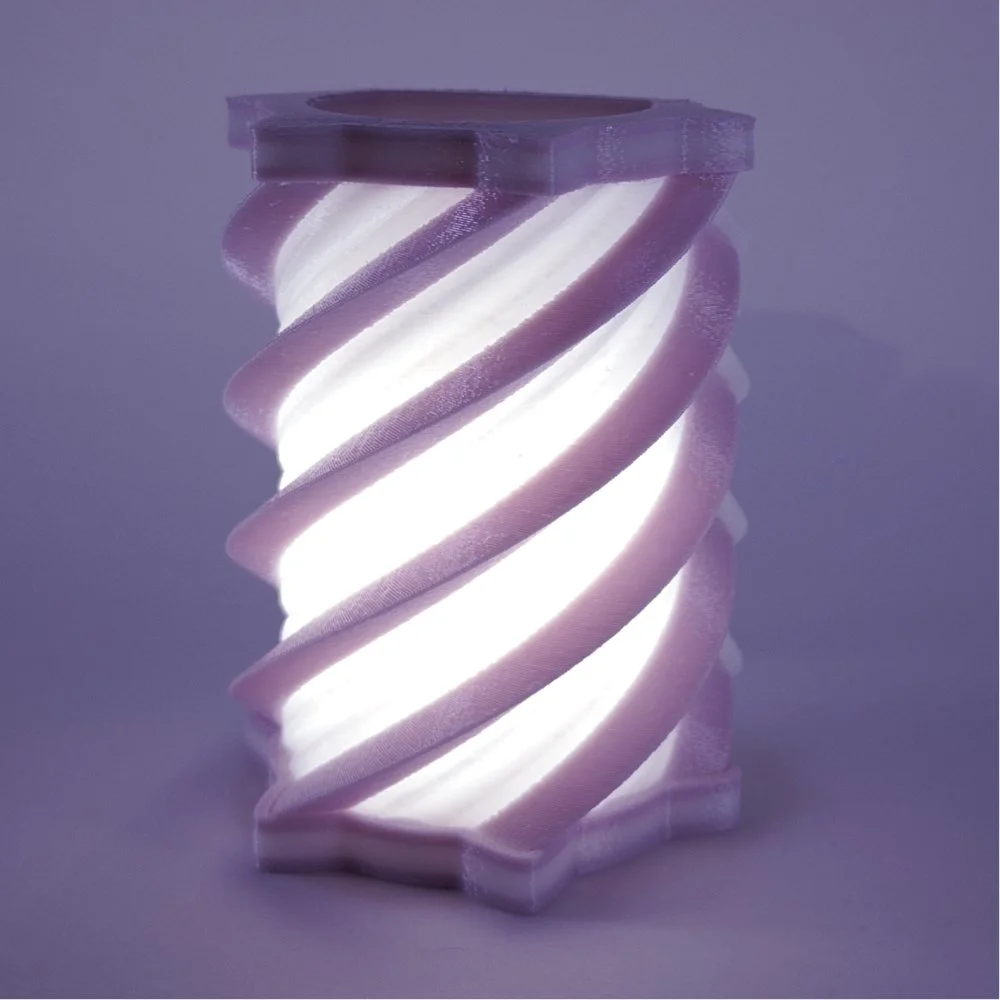 Single Spiral night light in lavender, lit up