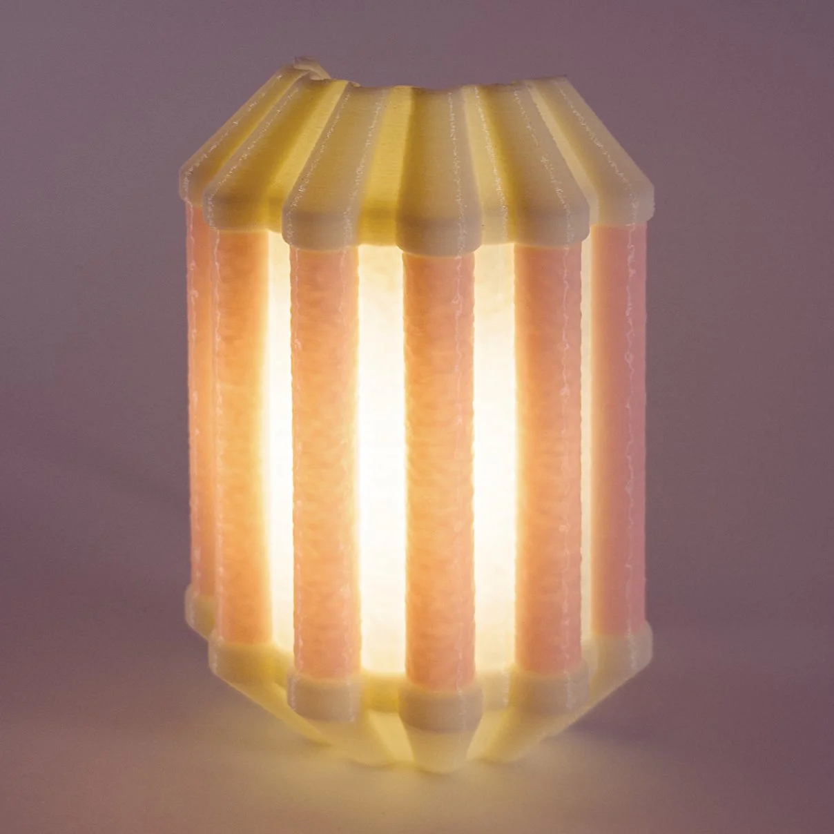 Single pink Drapes night light, lit up
