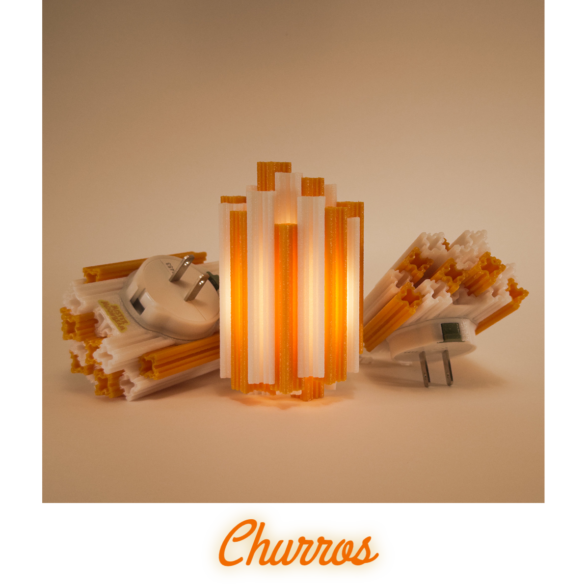Three Churros night lights in orange, one glowing, with plug prongs visible