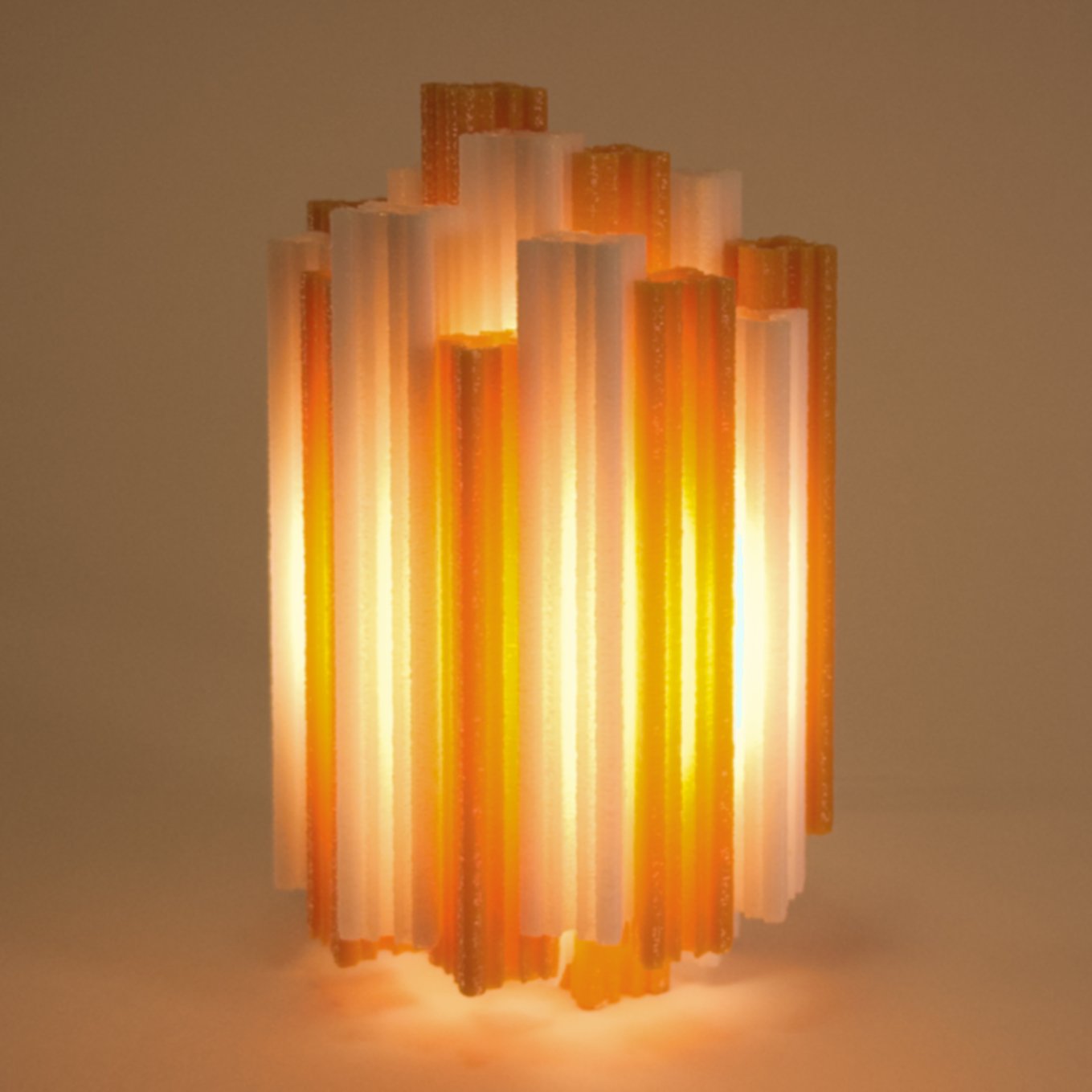 Single orange Churros night light, lit up