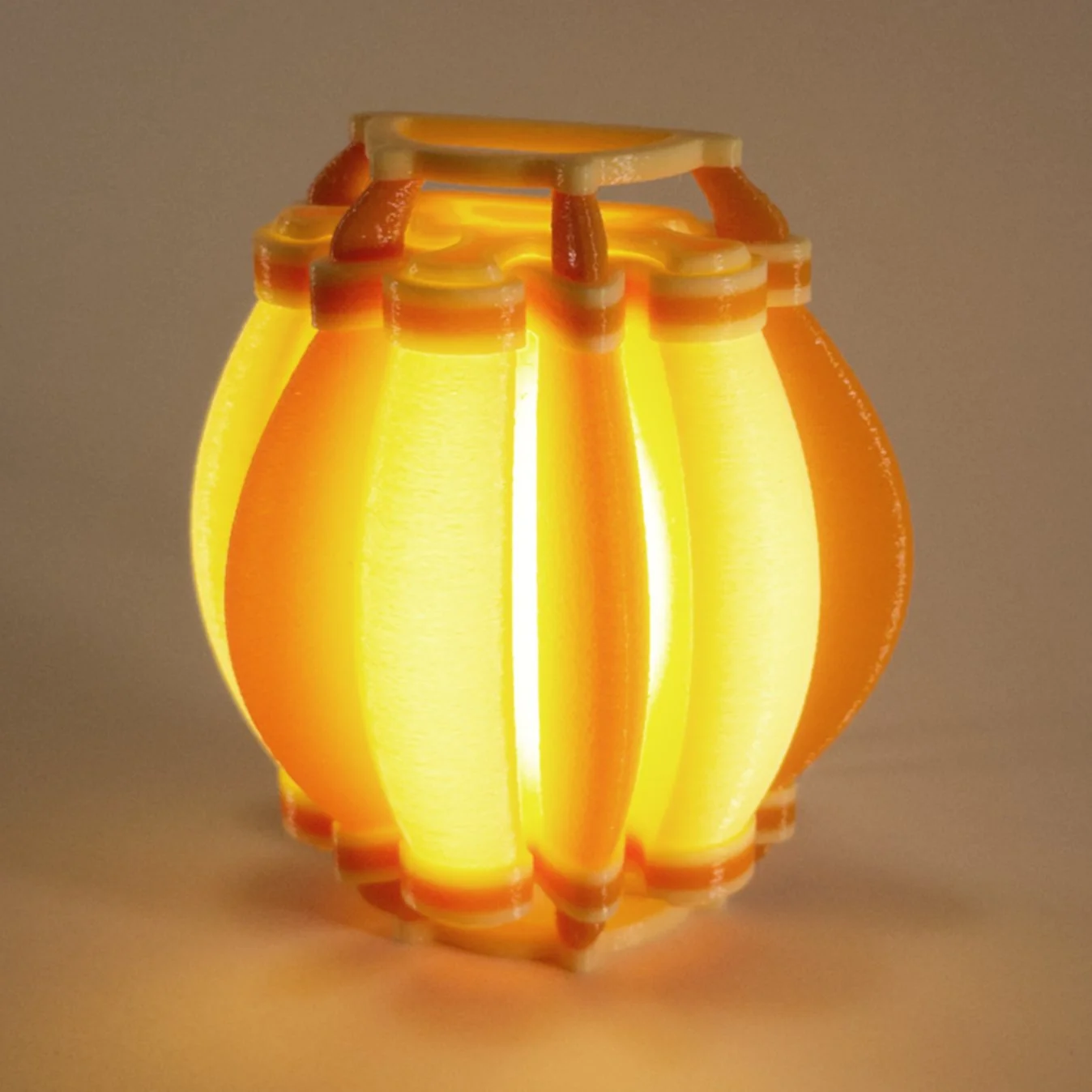 Single Airship night light in yellow and orange, lit up
