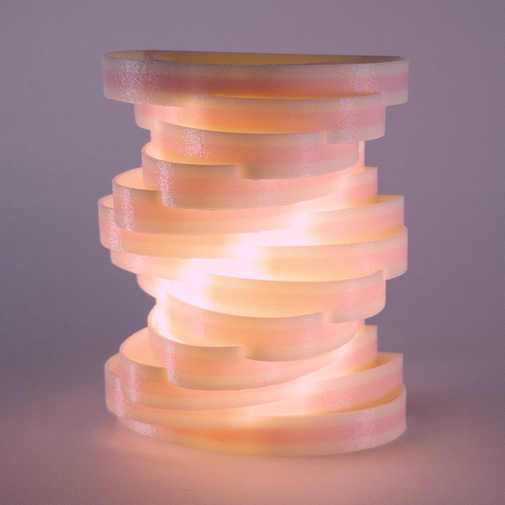 Single pink Spinoval night light, lit up