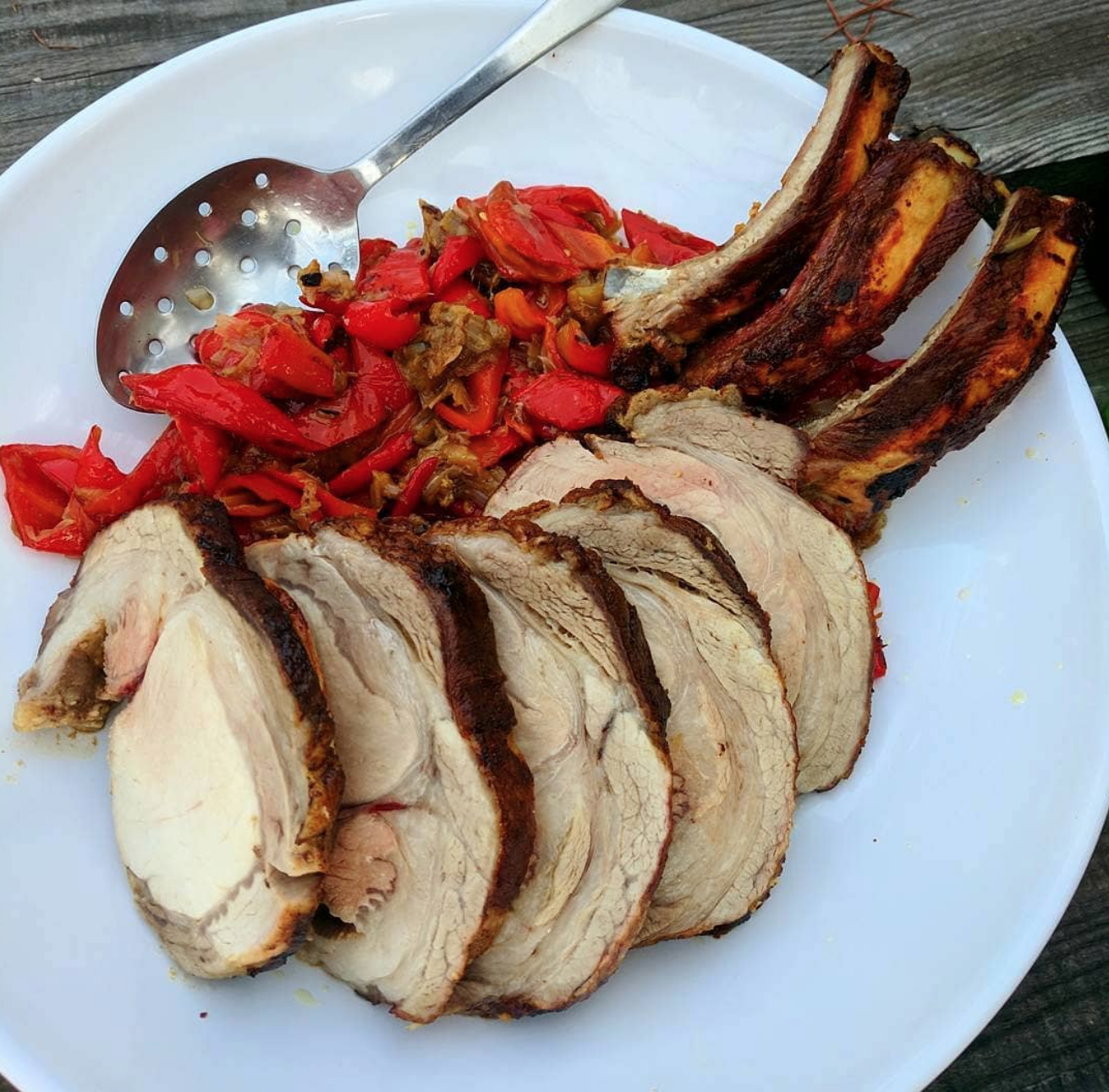 COUNTRY RIB ROAST - this wonderful cut is versatile and can be cooked to 140 like a pork chop or slowly cooked to a pul apart texture at 185-200F. This cut is easiest to serve when you remove the ribs and slice. On the grill: Heat your coals (or fire up the propane) to roughly 350-375. Cook indirectly for 50-70 minutes or until an internal temp of 140F. Rest for 10-15 minutes, and slice. In the oven: Preheat the oven to 375F, roast for 45 minutes, check the temperature looking for 140F. Rest, slice, and serve.
