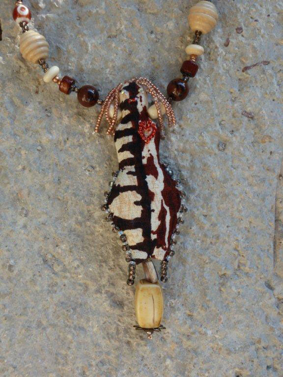 Goddess doll necklace