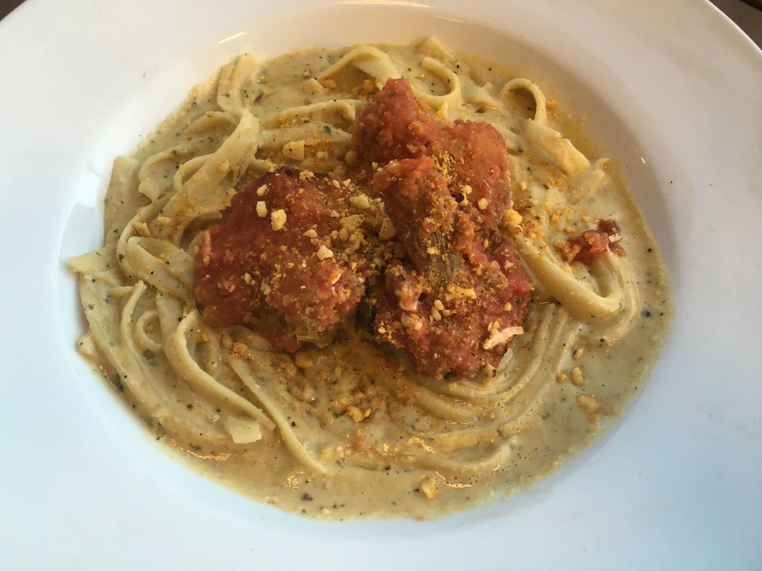 Dinner Entree Two: Mushroom Parmesan and Red Pesto Alfredo on Fettucine. 