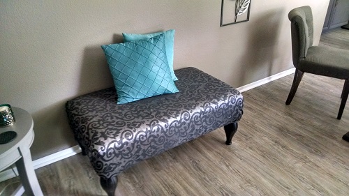 This used to be in the corner where the above ottoman is now. All recovered!