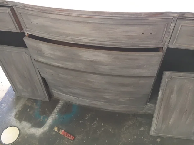 After adding, some stain, white paint, and some gray.