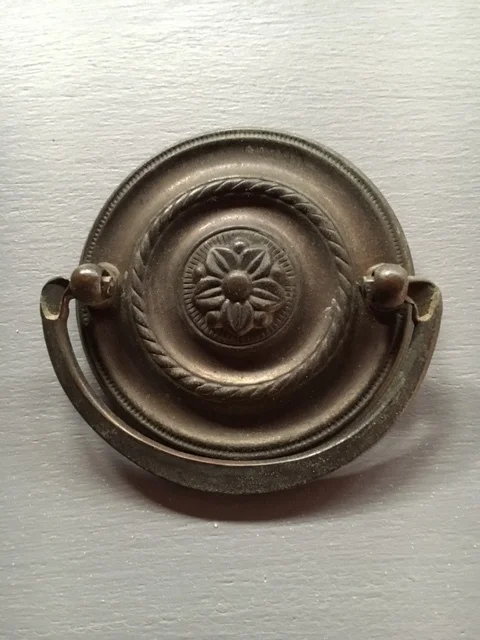 Original hardware that came on the piece.