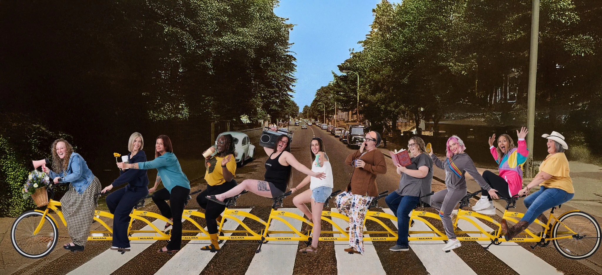 PCI Agents and Staff on an 11-seat tandem bicycle on the Abbey Road crosswalk