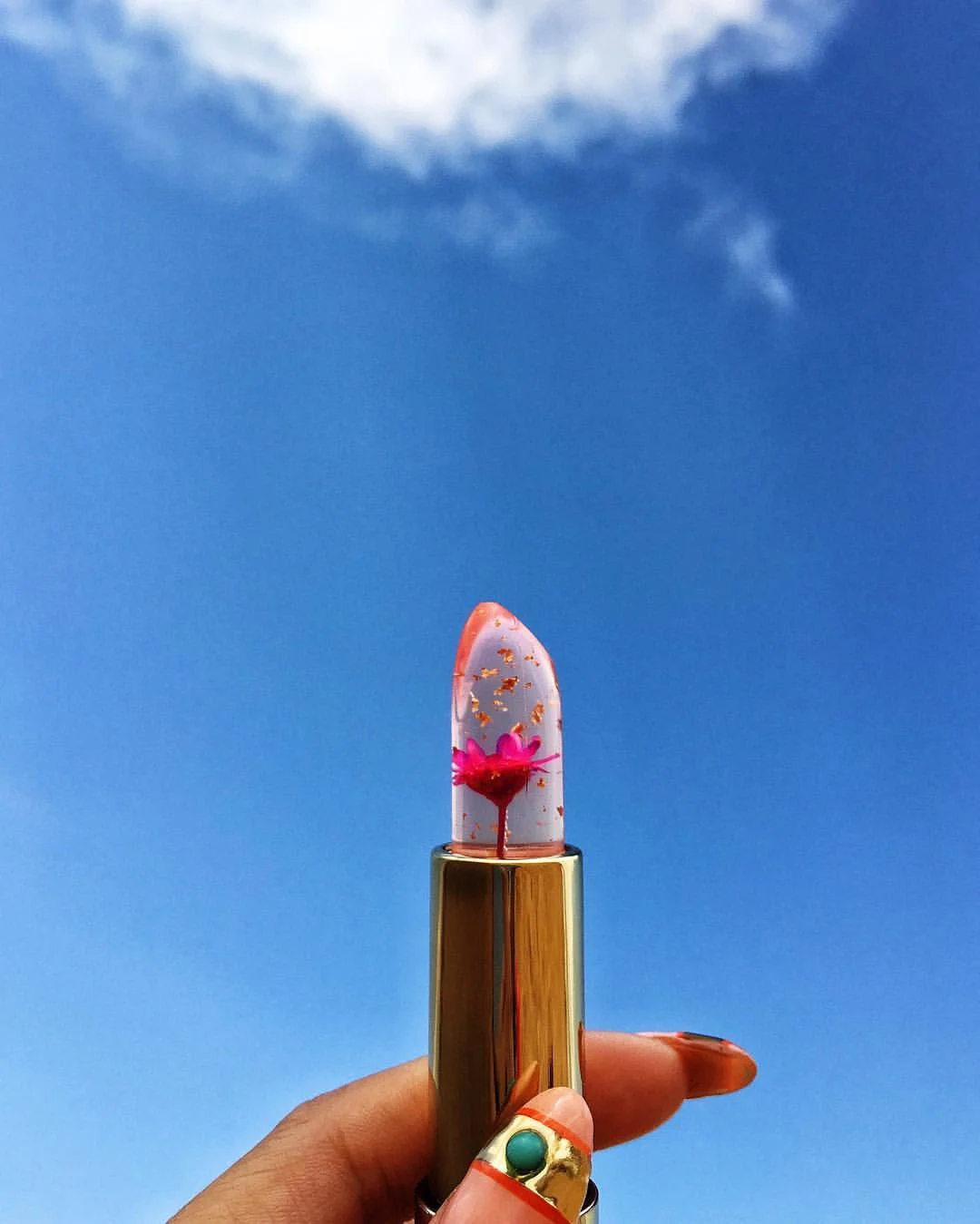 Clear jelly lipsticks that have real flowers in them