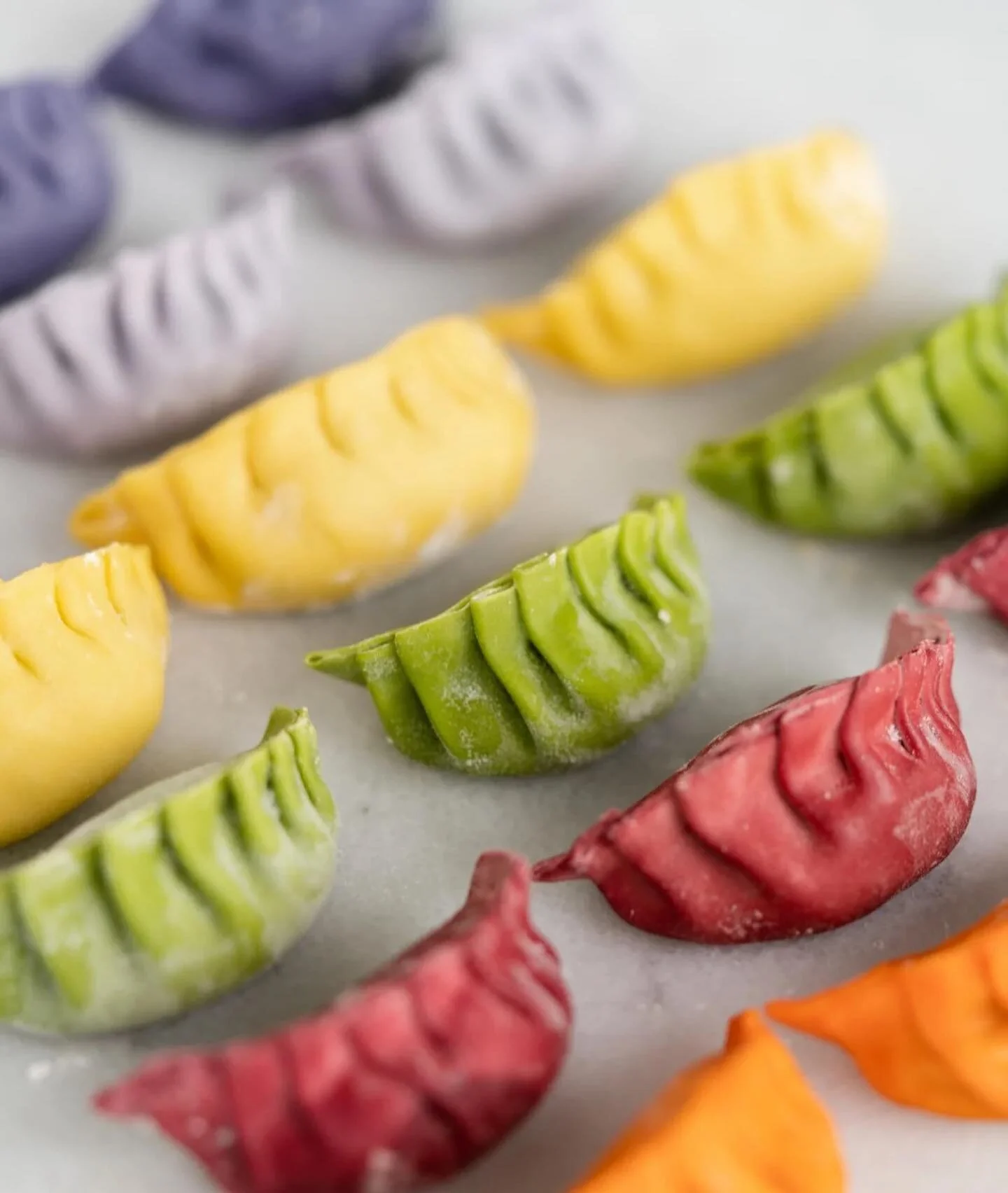 Making colored rainbow dumplings using vegetables like spinach, carrots, beets, and pumpkin. ❤️🧡💛💚💙💜💖
