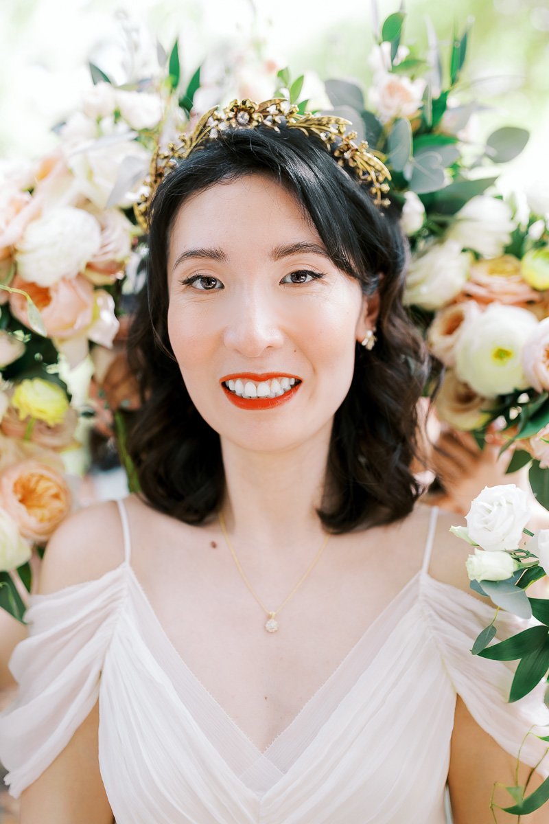 Bride with bouquets around her