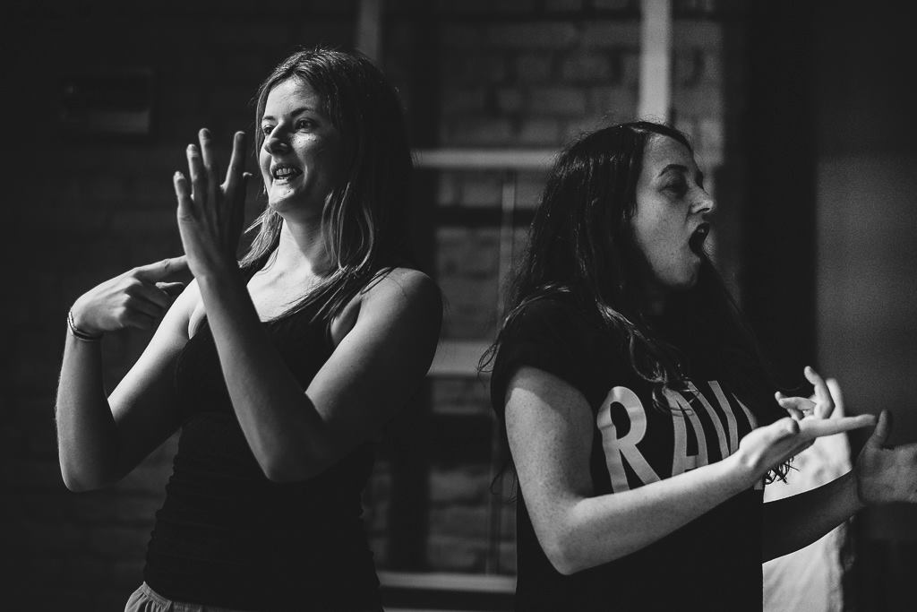 Erin Hutching and Sophie Stone signing in a rehearsal. Photo by David Monteith-Hodge 