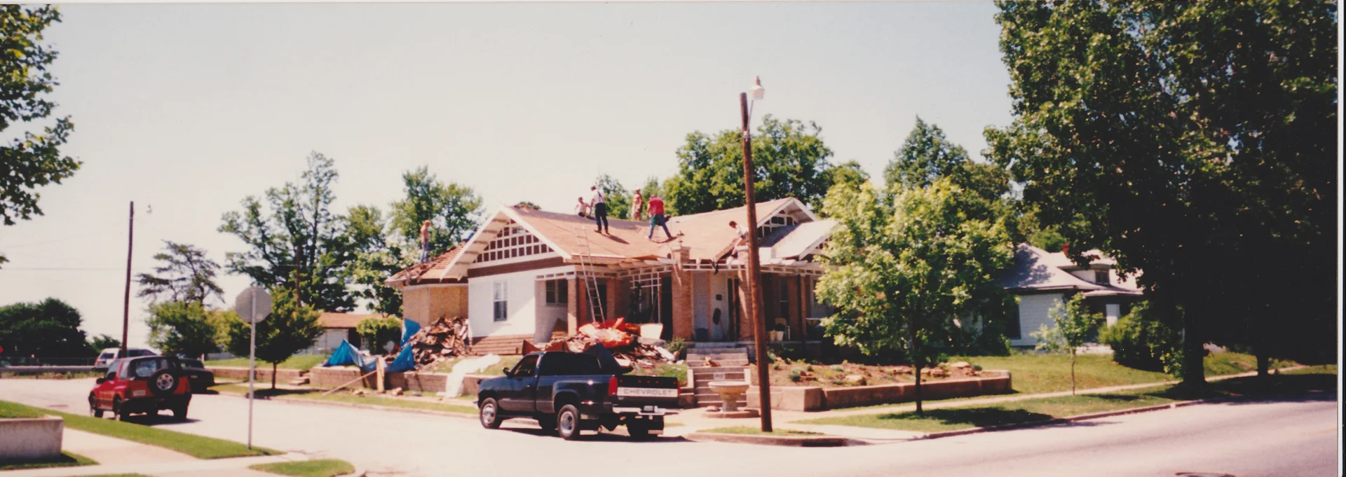 902 N. Denver receiving a new roof by fellow neighbors. (Image by McDaniel Family)