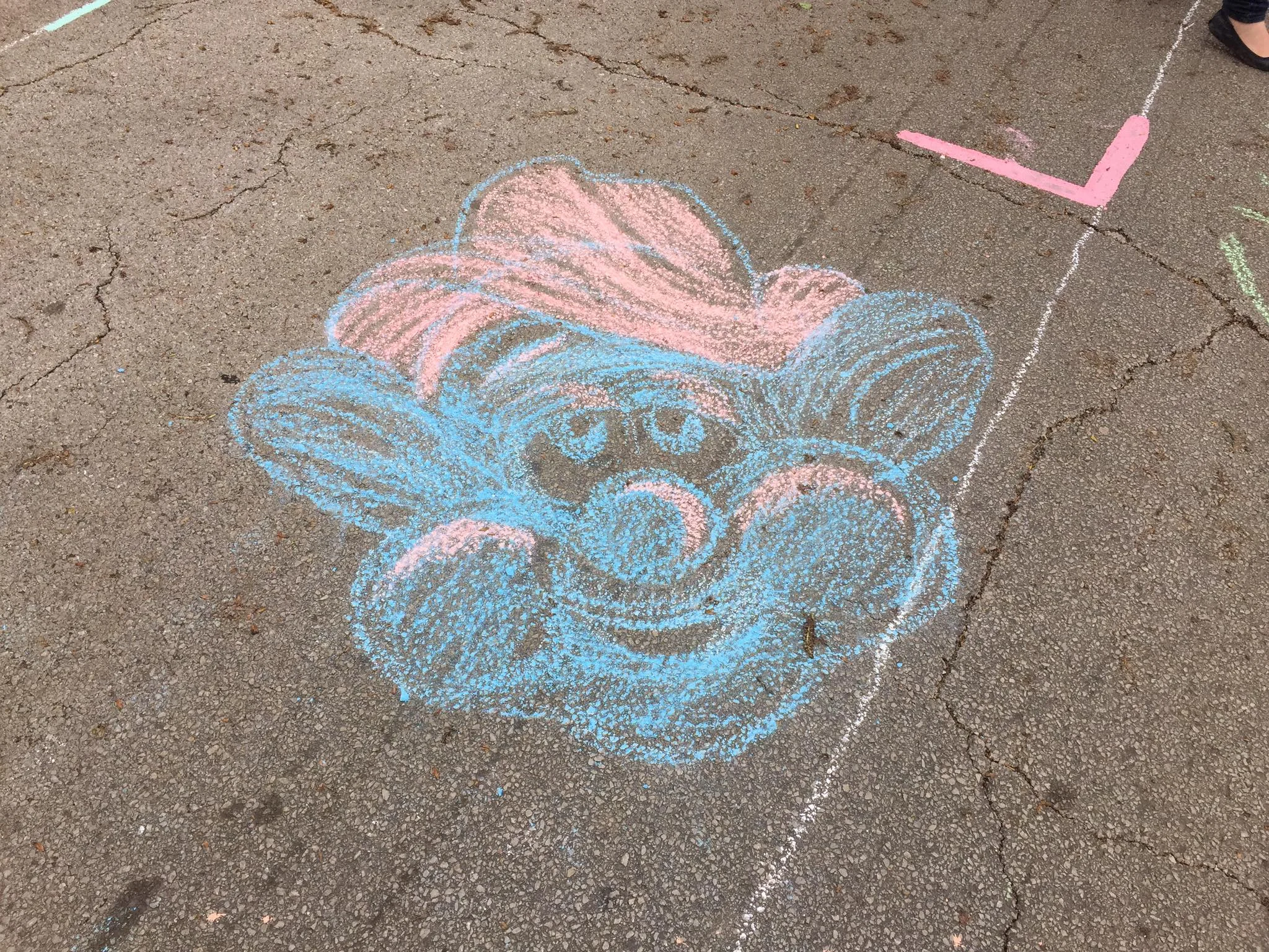 A cartoon face designed and chalked by Oklahoma House District 73 Representative Regina Goodwin during "Chalk the Walk". (Photo © 2017 Brian Parker)