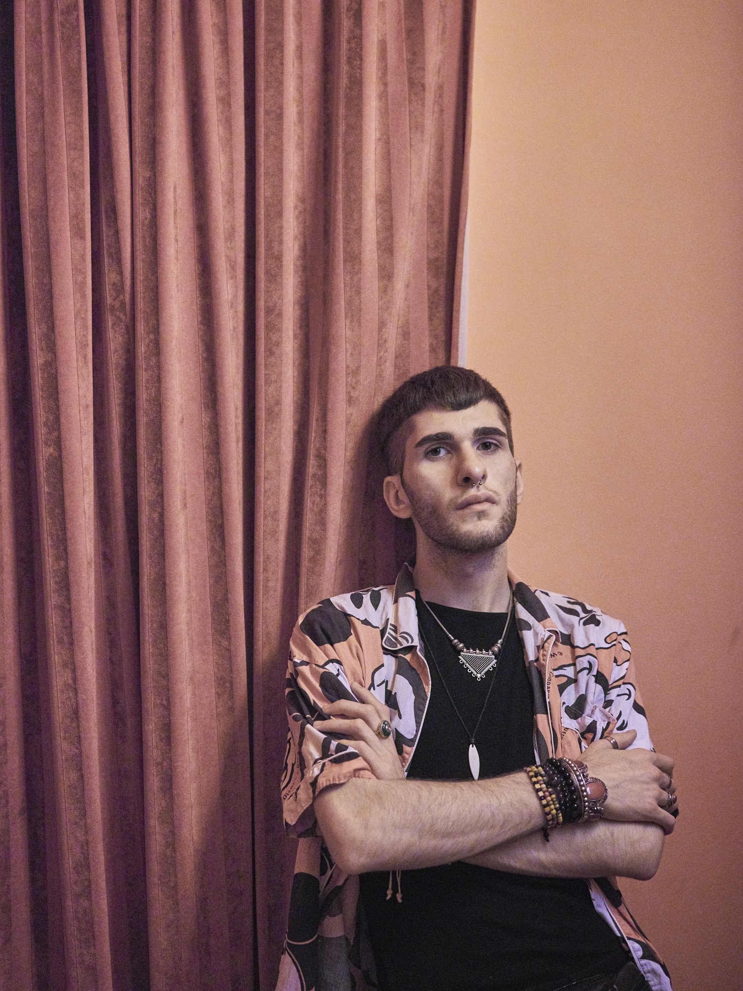  Luka poses for a portrait. He works as a bartender in the first LGBTQ friendly bar in Tbilisi, the Success Bar. Through his outing he lost contact with family members. Frequently he feels discrimination against himself on the streets causing his hom