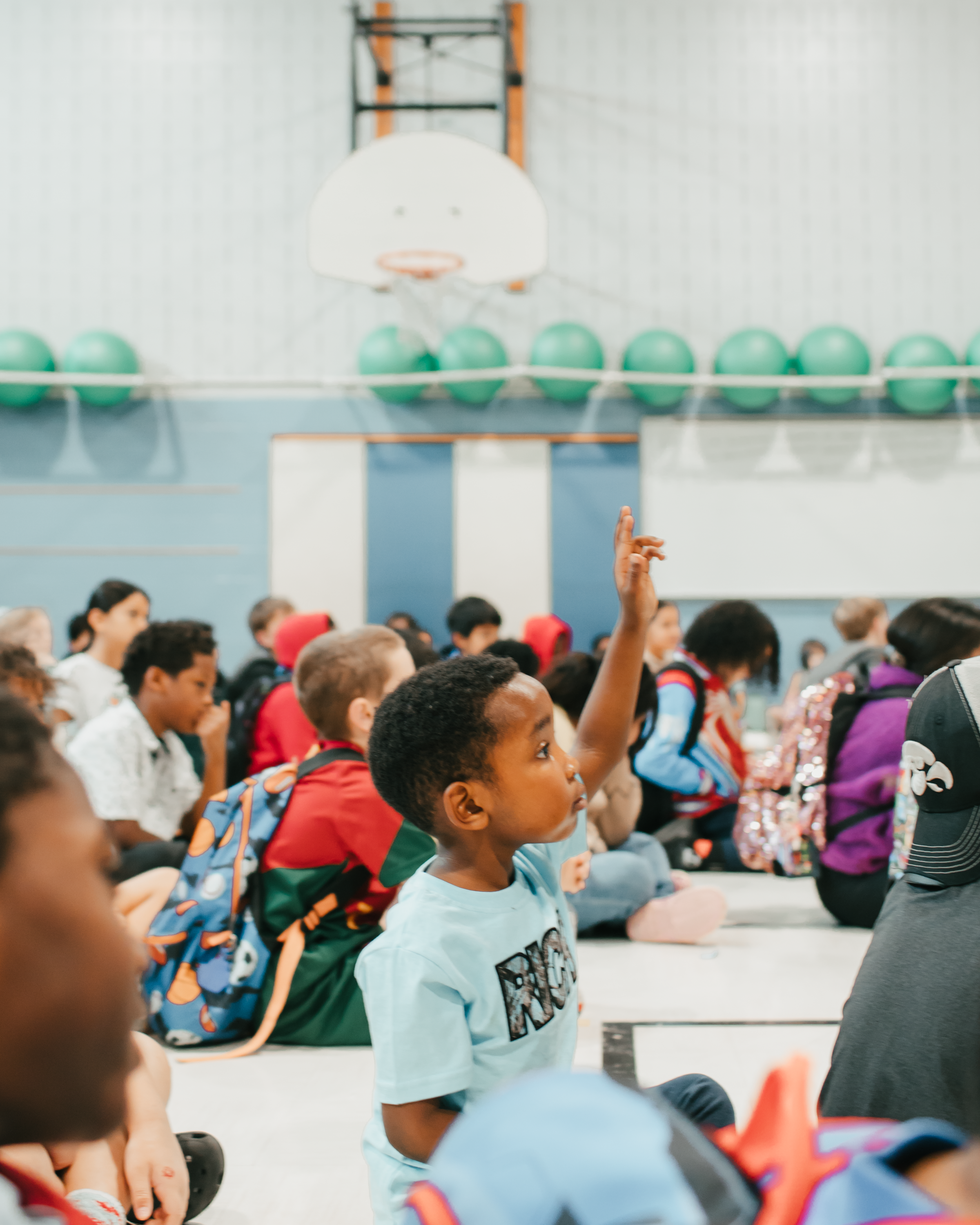 Ballet Des Moines Artist-in-Residence Olivia Valentine engages with students at Findley Elementary, based on a BDM collaboration with By Degrees Foundation.
