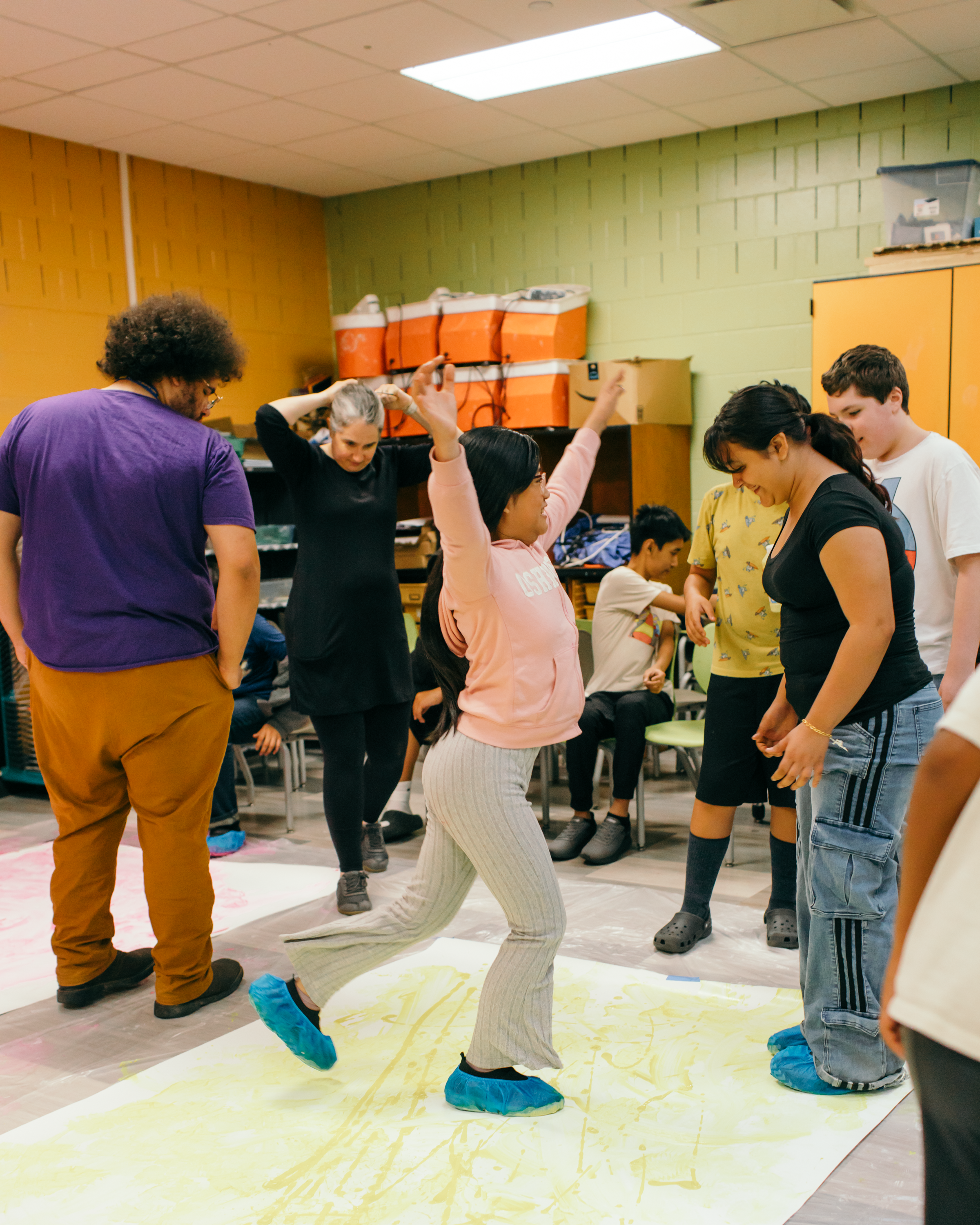 Ballet Des Moines Artist-in-Residence Olivia Valentine and BDM company dancer Megan Boyette, in class with students at Findley Elementary, based on a BDM collaboration with By Degrees Foundation.