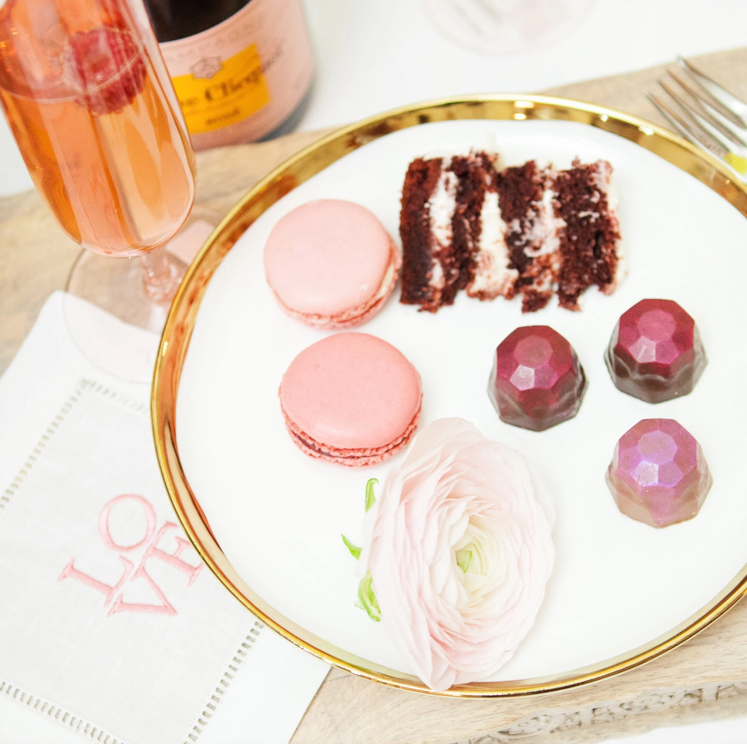 A single ranunculus on the plate served as a simple and clean accent to the display.
