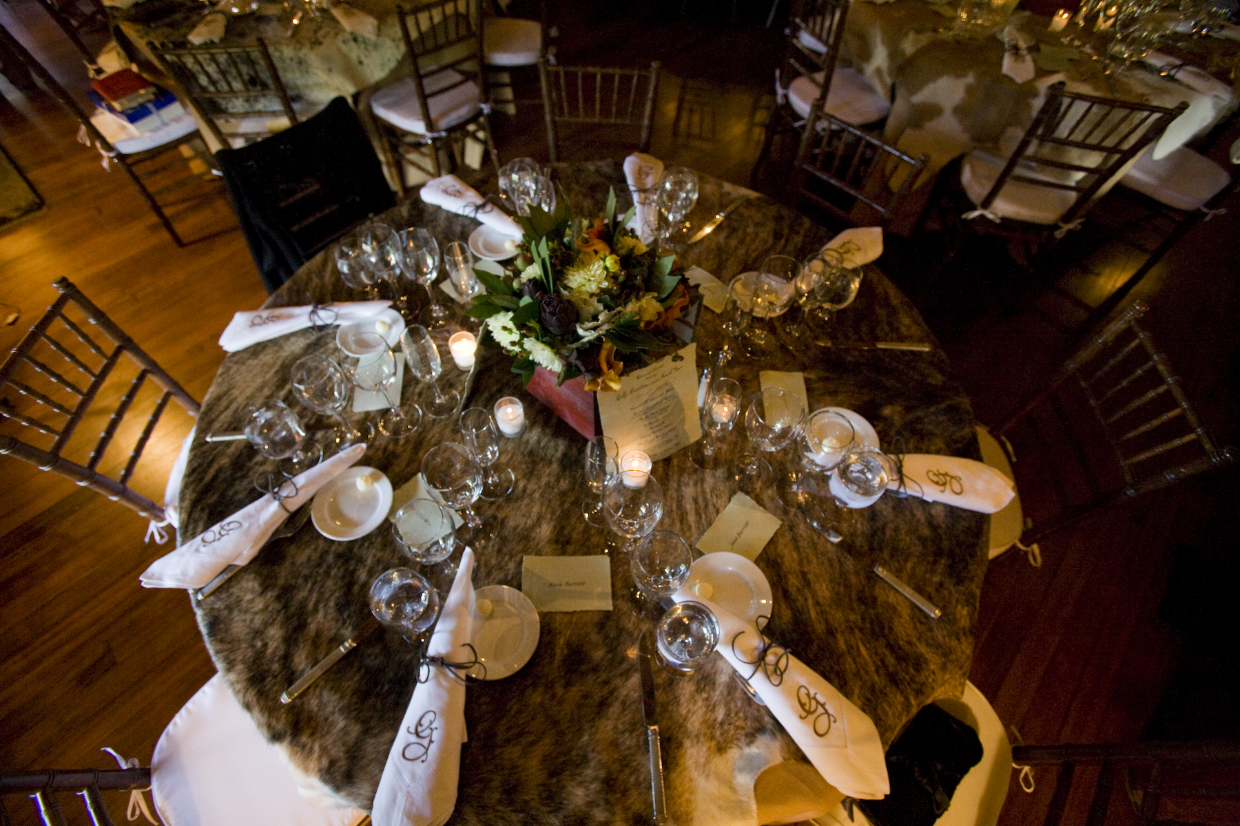We traded traditional linens for a hide for the tabletops at our rehearsal dinner.