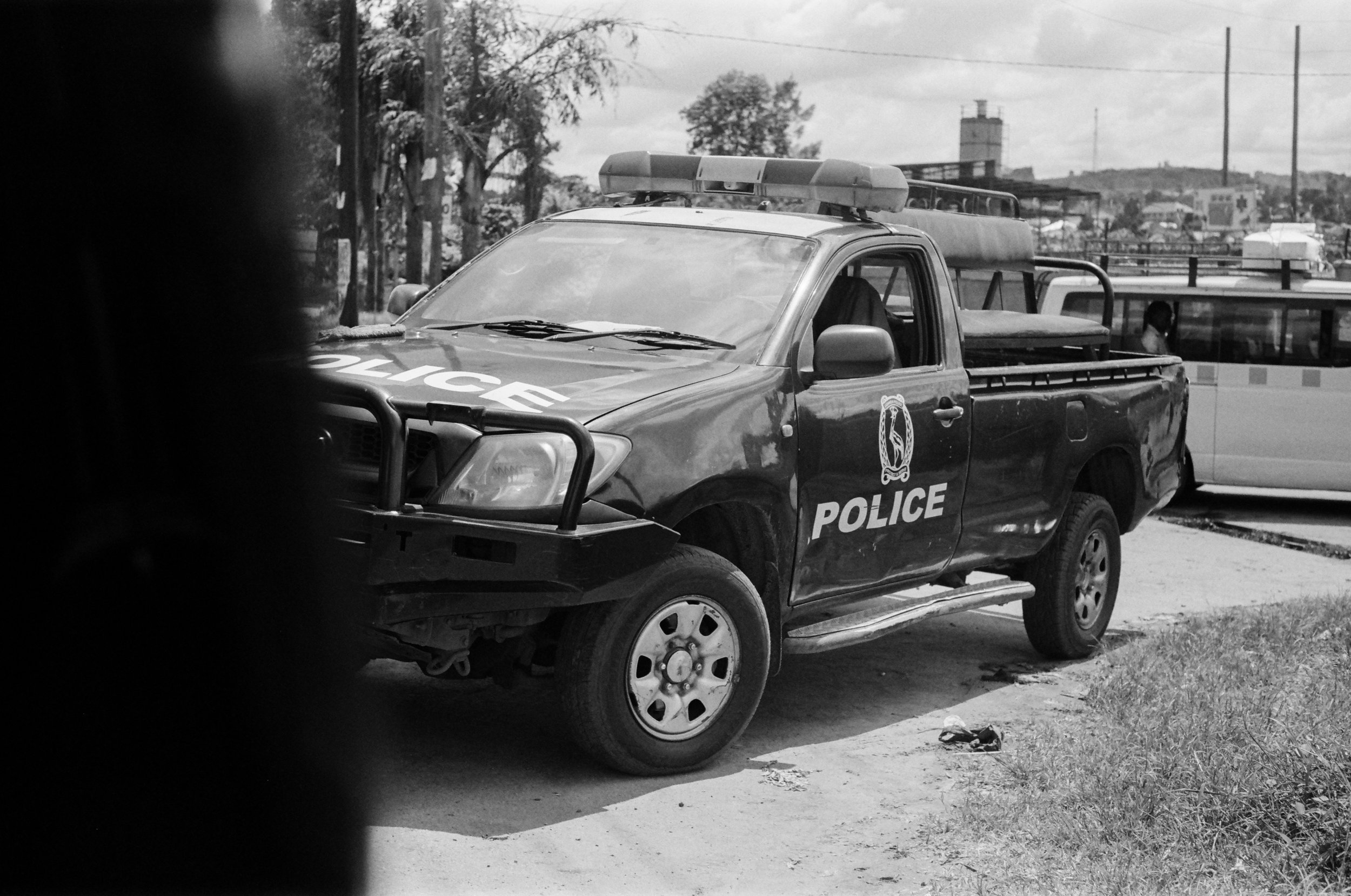 Stopped at a police checkpoint about 3 hours into the drive. Delta 100 35mm. 