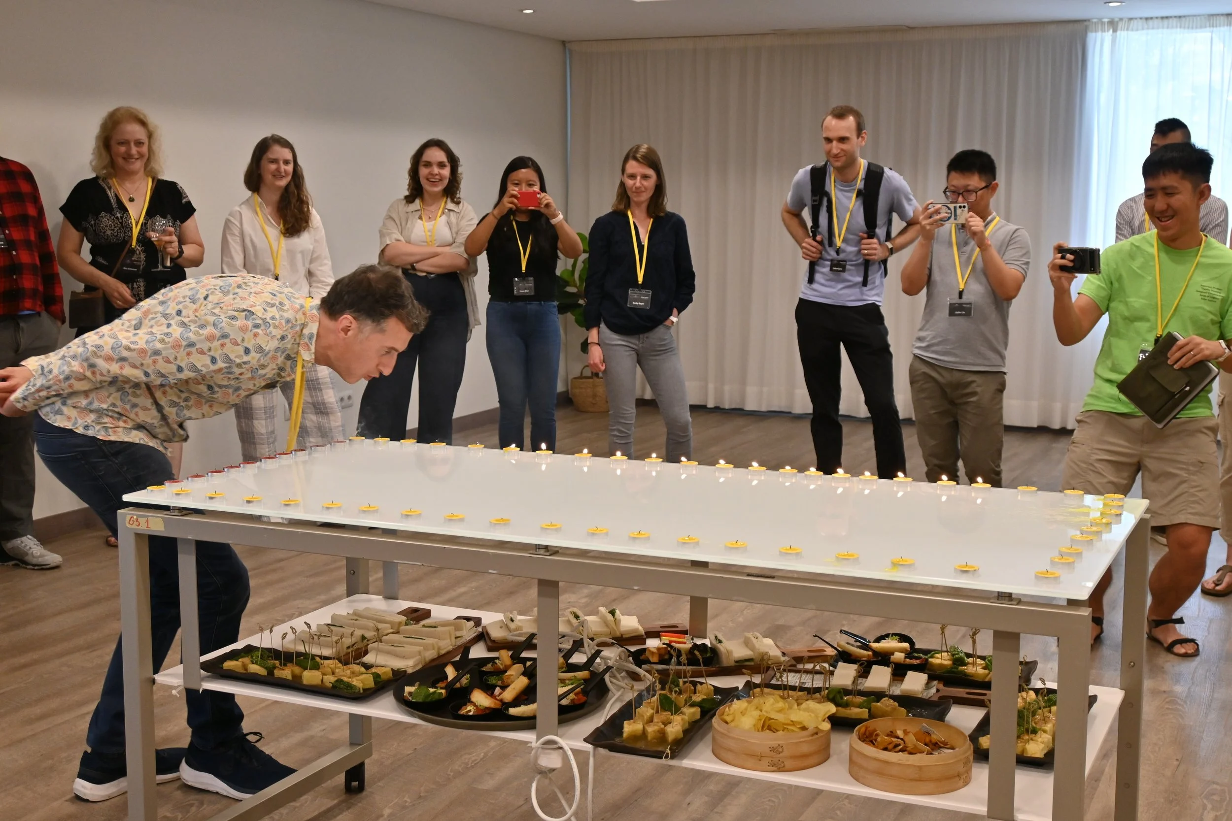 Alex blowing out many many candles at the Schierpalozza 2024