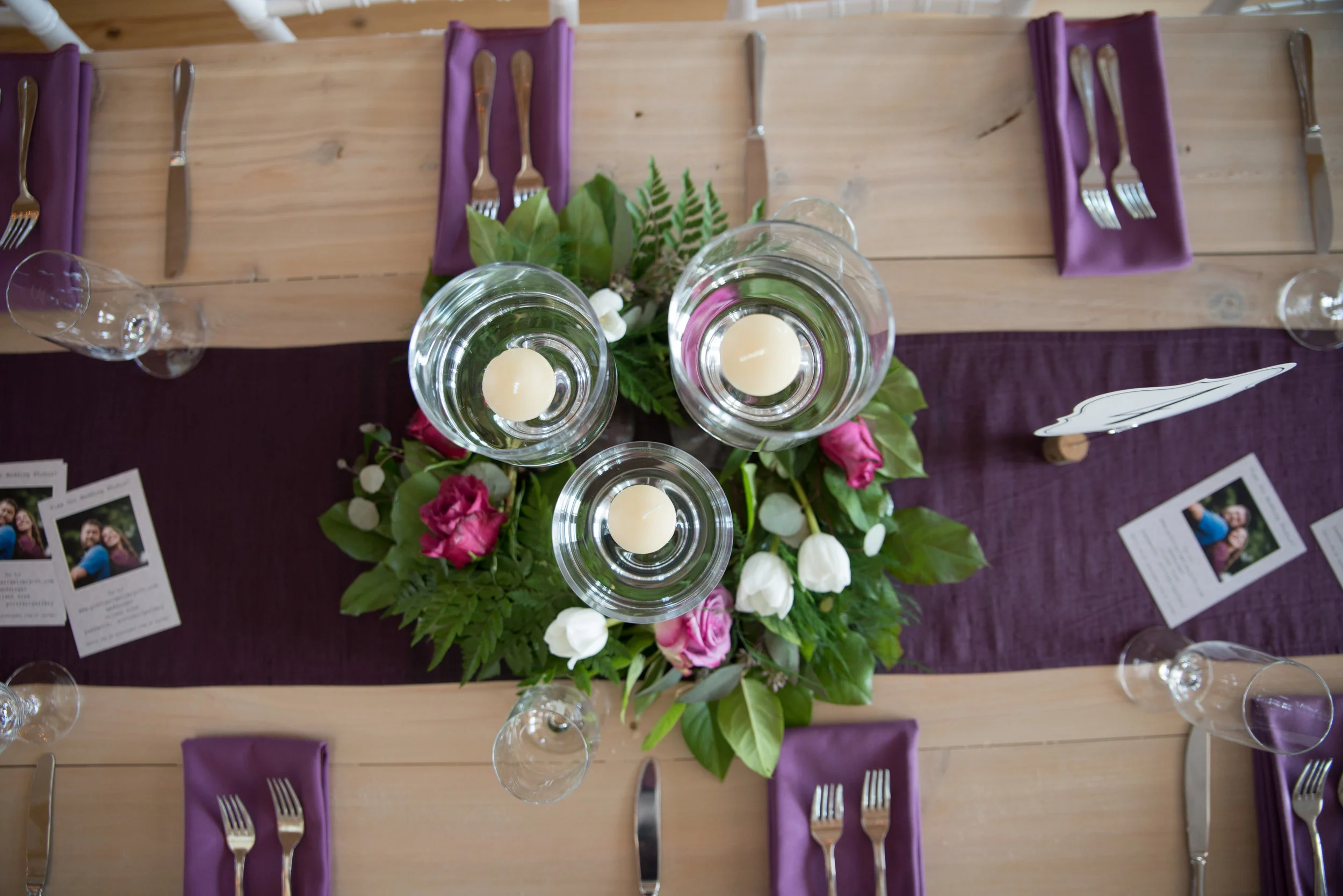 Our beautiful Custom Built Farm Tables with a white-washed wood Finish not only match our interior, but provide a natural finish that makes your color accents POP! Natural wood and white color scheme is the perfect canvas for your Stowe Wedding.