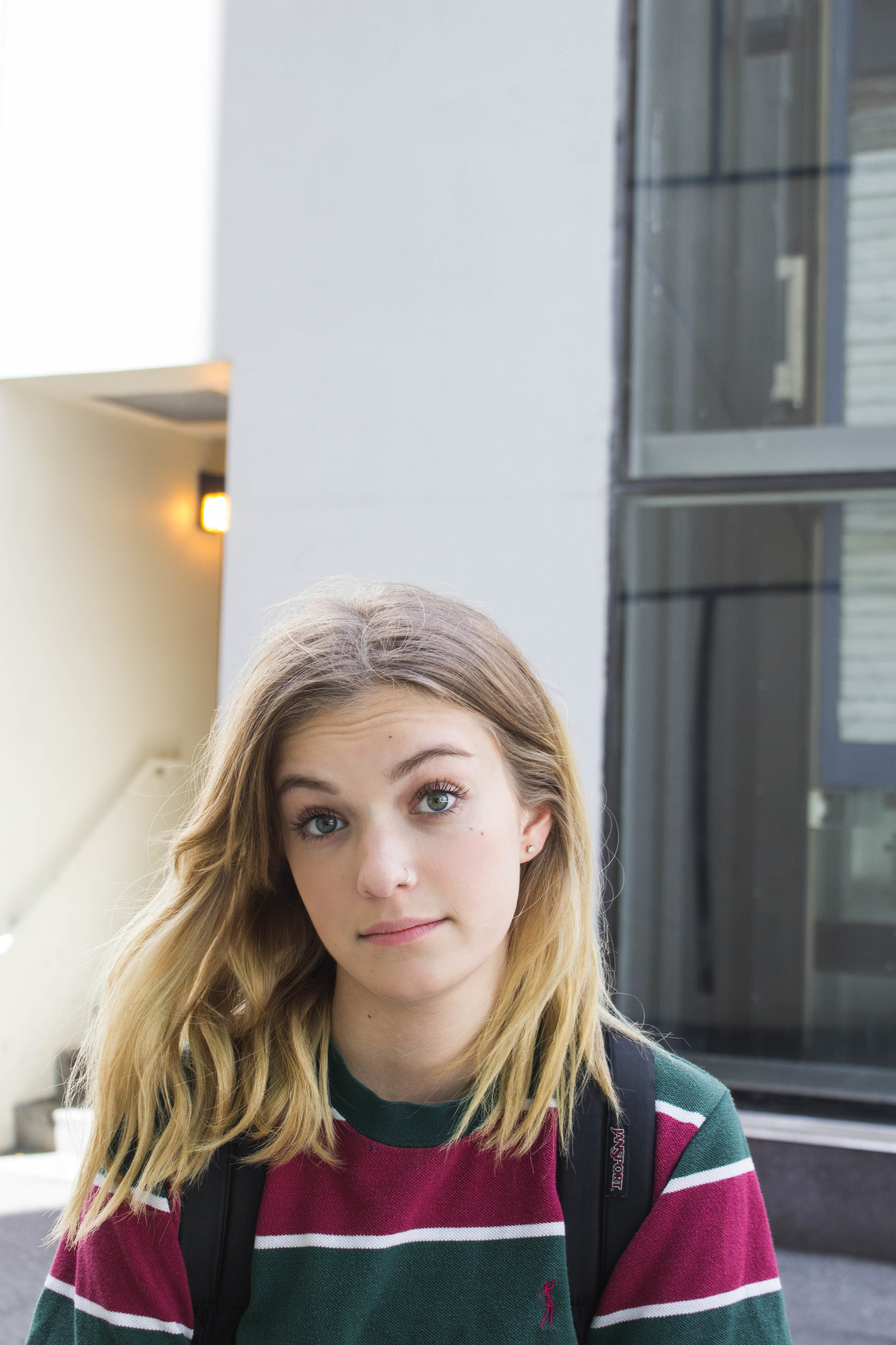This is how she looks at me most of the time. A mix between slightly amused, unimpressed, exasperated, and expectant that something of actual importance will flow from my lips. It usually doesn't and I just end up trying to make her love me by singing an annoying song or something...
