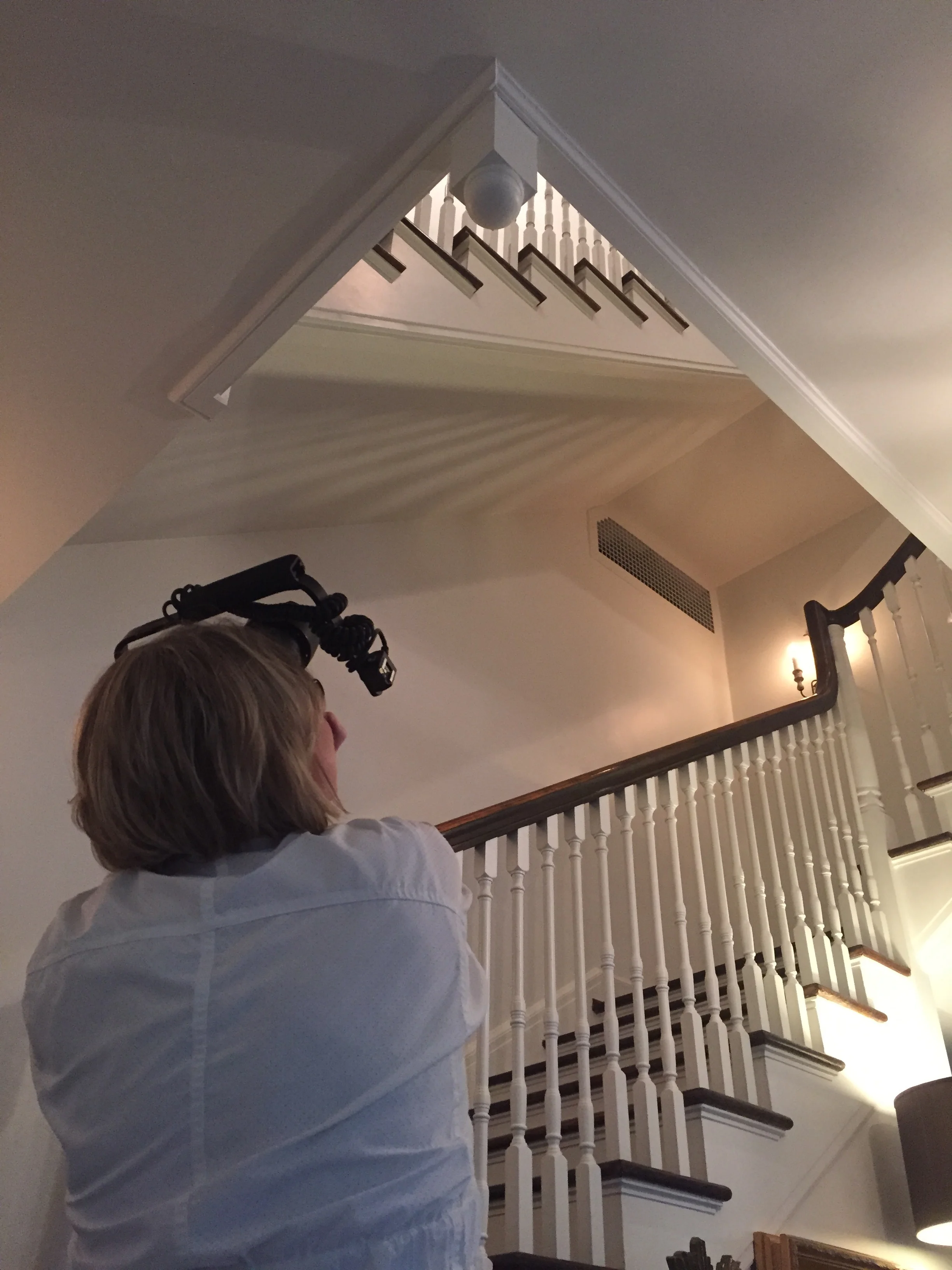 Friend and professional photographer, Catherine Pittman Smith, shooting a Surrey Road three story spiral staircase. 