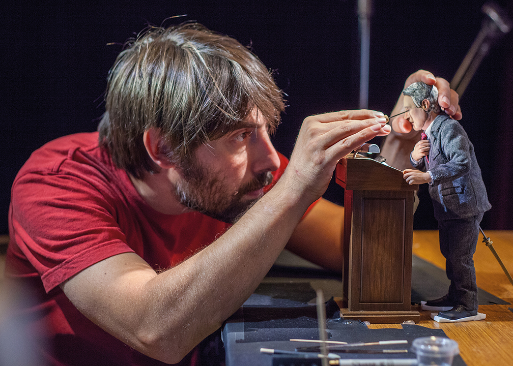 A crew member adjusts the angle of Michael's eyes. NB: No puppets were harmed in the making of this film. 