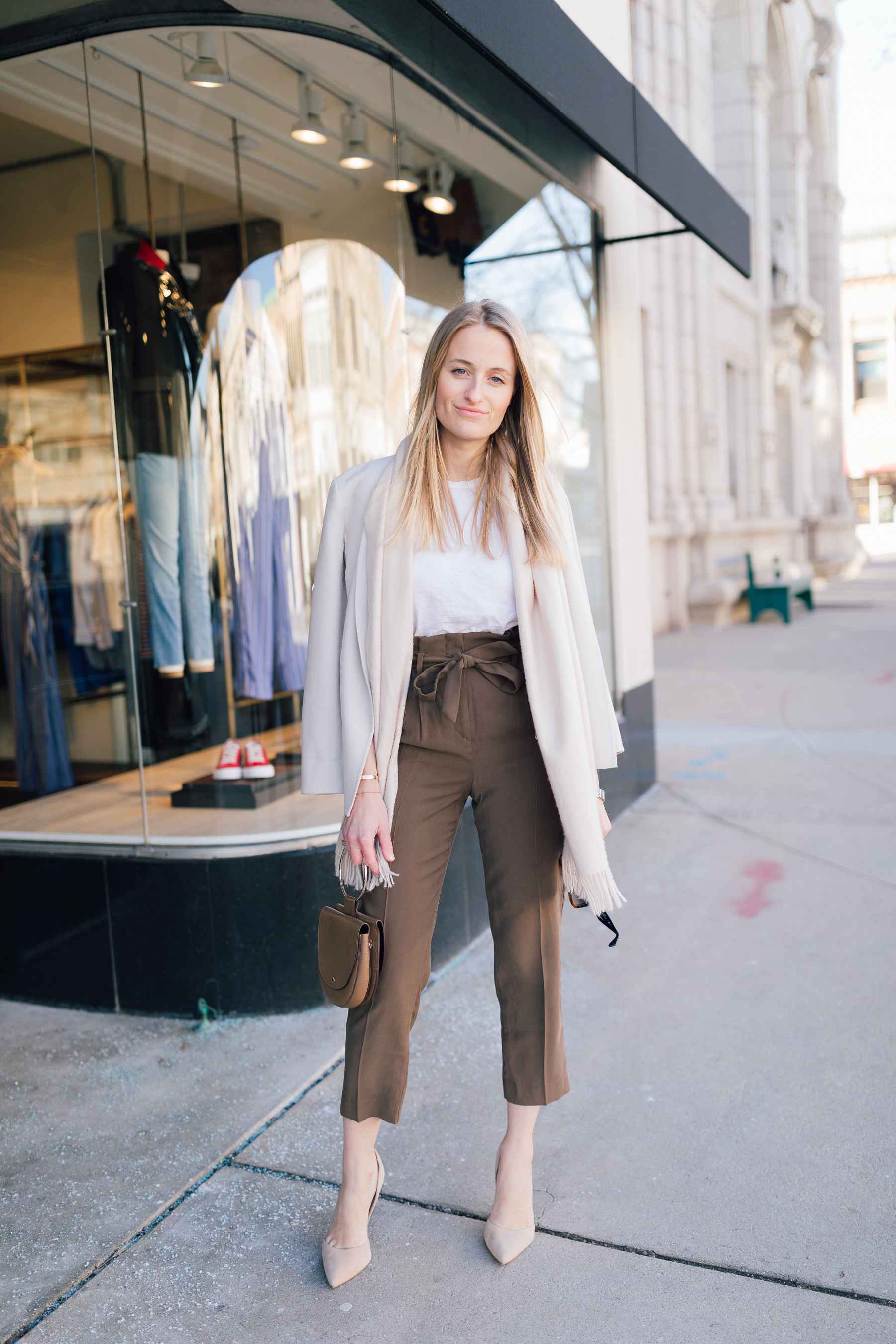 Cindy Trotta of Cindy Hattersley wearing a paper bag pant street style for work wear with a neutral blazer and scarf