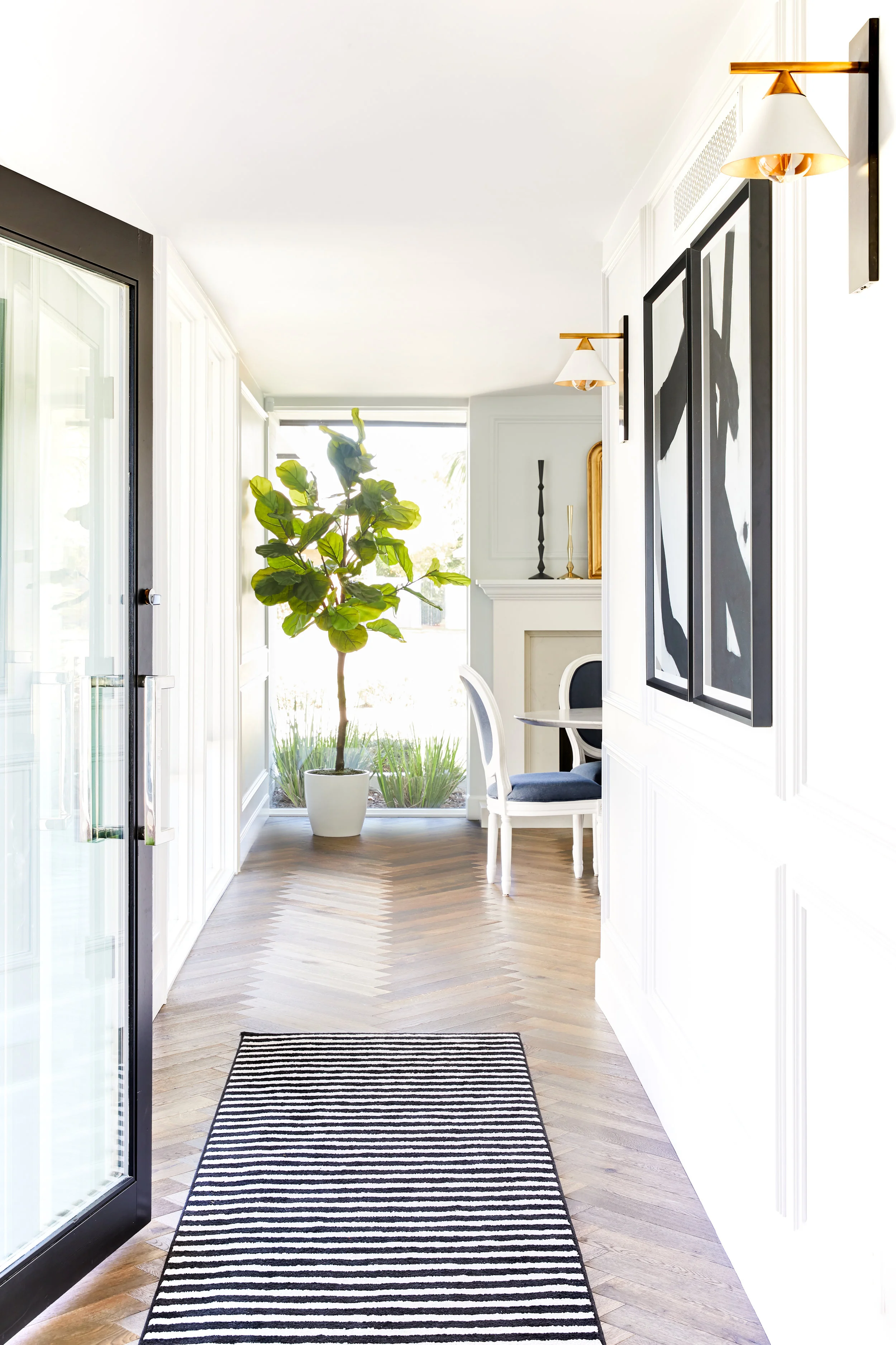 midcentury-modern-hollywood-regency-central-phoenix-renovation-construction-hallway-natural-light-large-windows.jpg