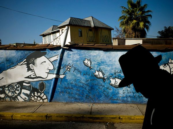  Mural of Neruda graces the Bellavista neighborhood in Santiago, Chile. Photograph by Tomas Munita, The New York Times/Redux