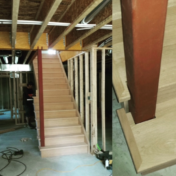 Open Part 1 Side Oak Stairs. We had to build half of this stair on-site and notch it around the steel jack post which will be cladded on a later date. Job Location: Snow Valley, Ontario