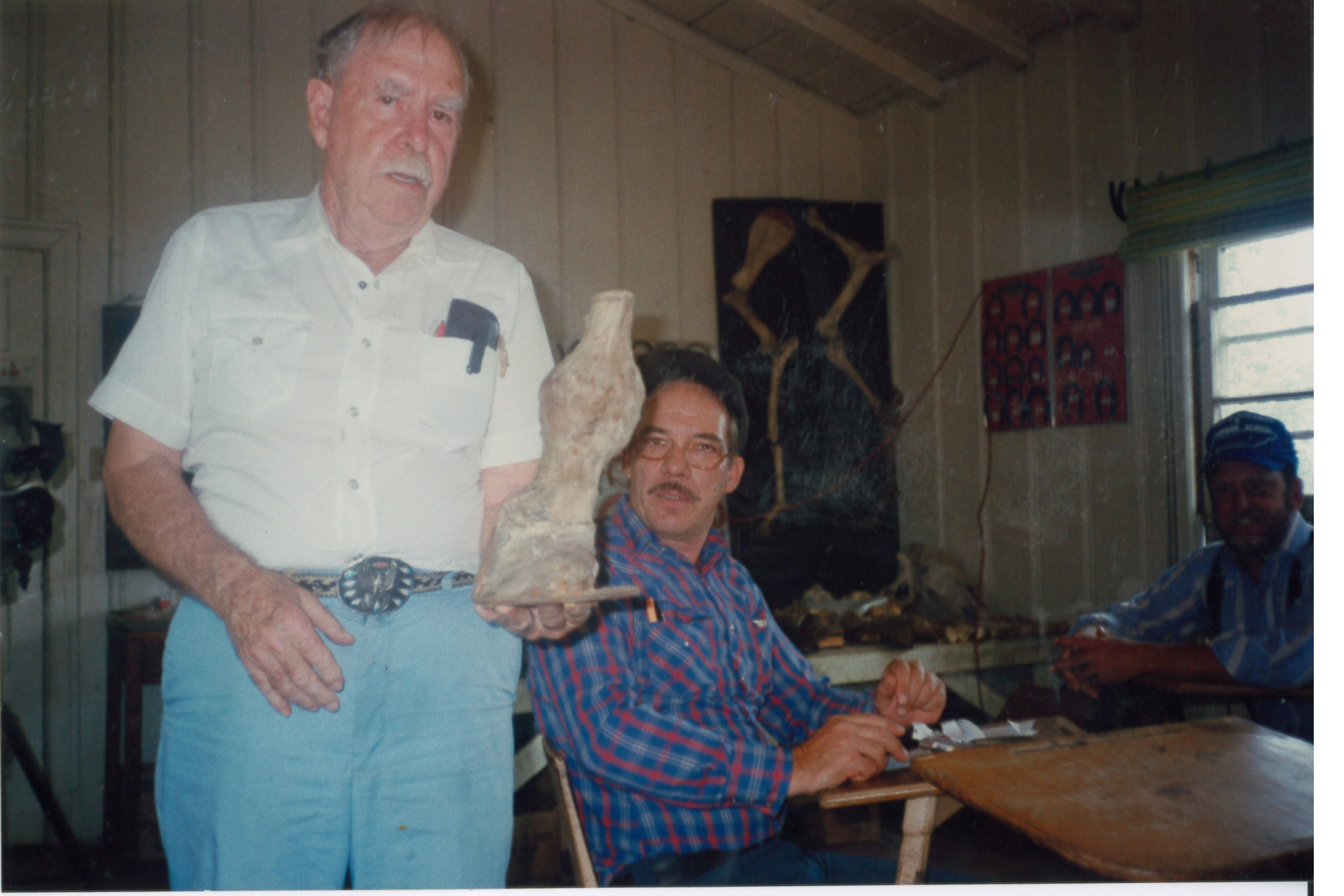 Elmer Seybold at left in his study room.